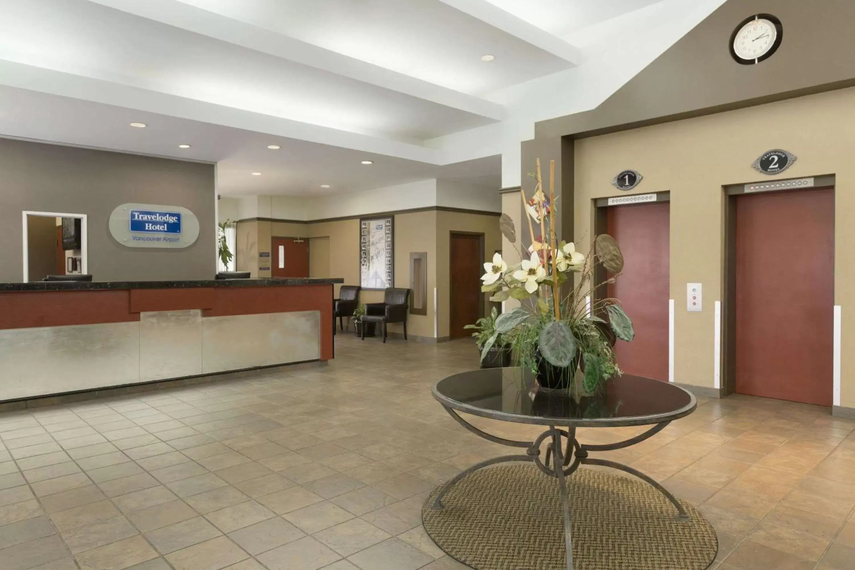 Lobby or reception in Travelodge Hotel by Wyndham Vancouver Airport Lobby or reception in Travelodge Hotel by Wyndham Vancouver Airport