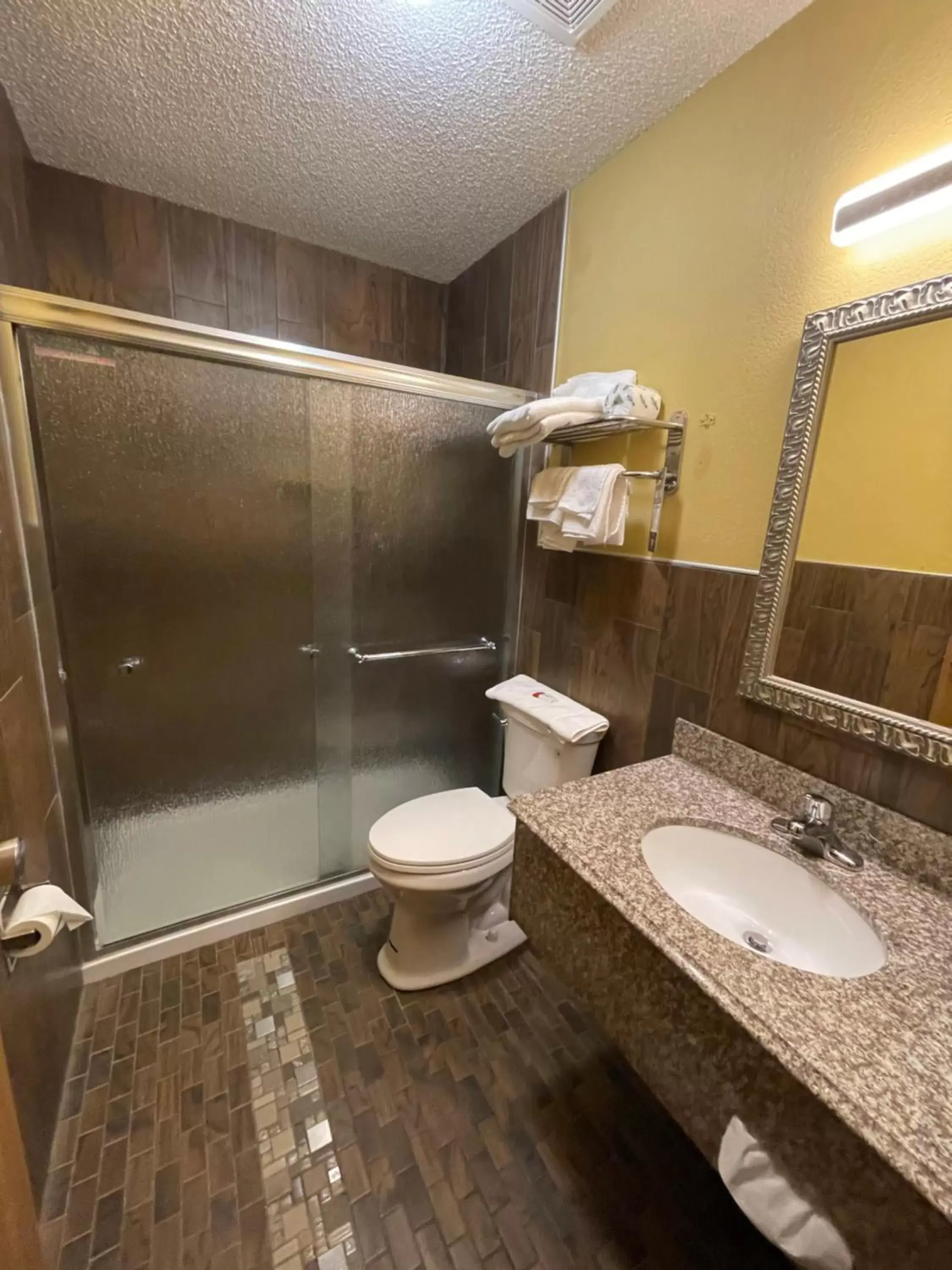 Shower, Bathroom in Super 8 by Wyndham Van Buren/Ft. Smith Area