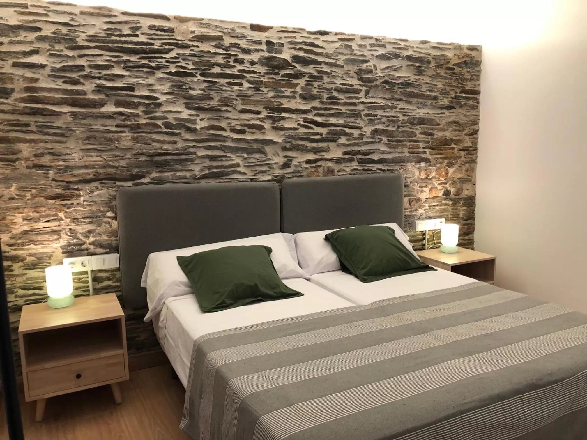 Bed in APARTAMENTOS ARMANYA 3