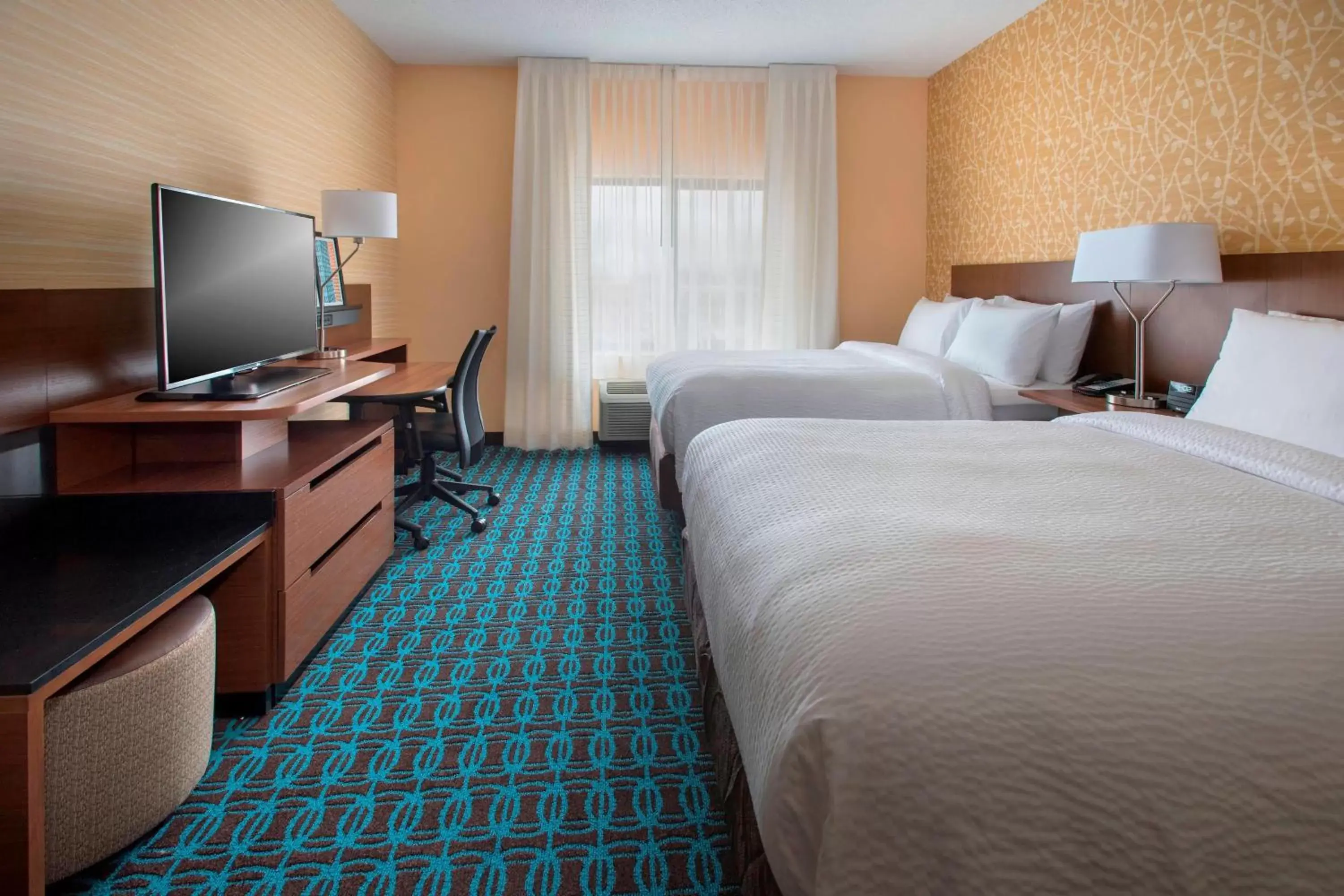 Photo of the whole room, Bed in Fairfield Inn & Suites by Marriott Syracuse Carrier Circle