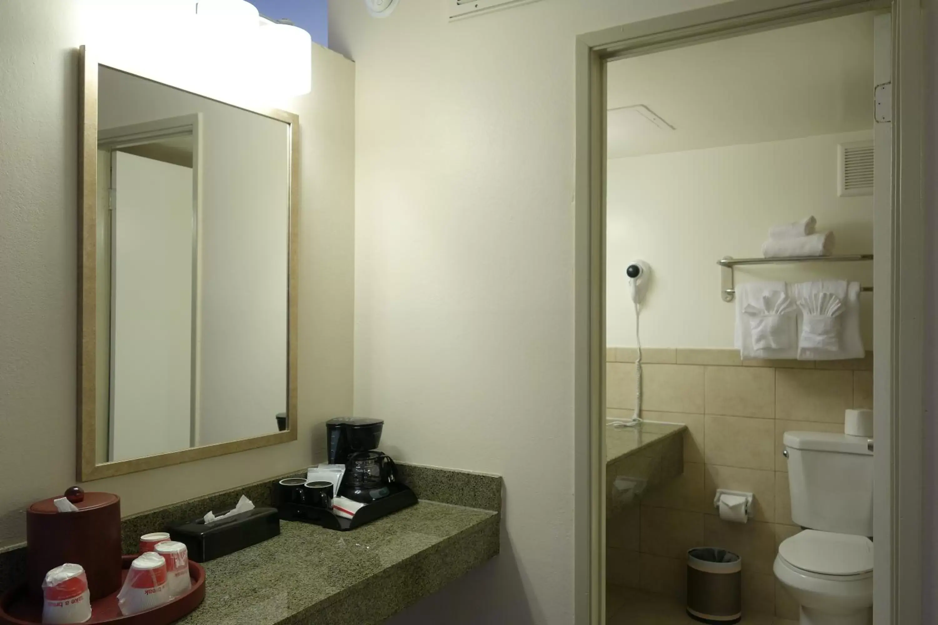 Bathroom in Ramada by Wyndham Sacramento