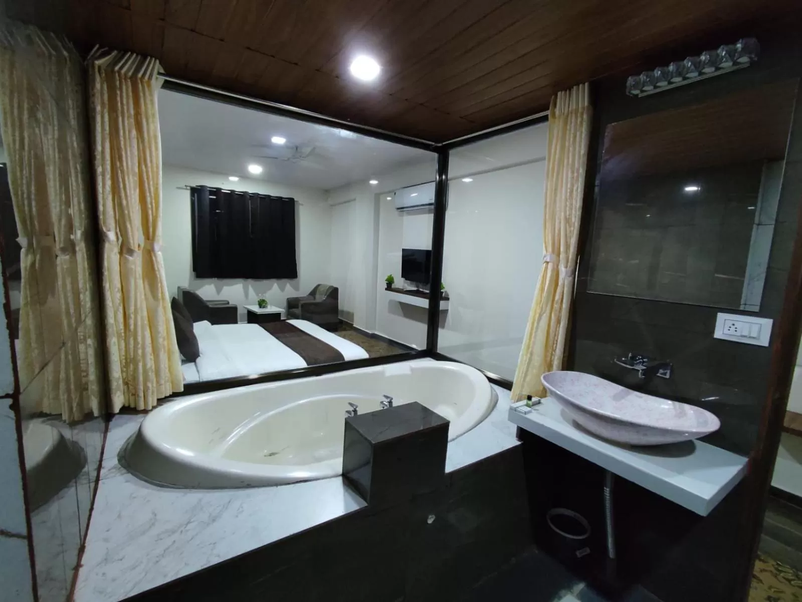 Bathroom, Bed in Hotel Jurkis, Kolhapur