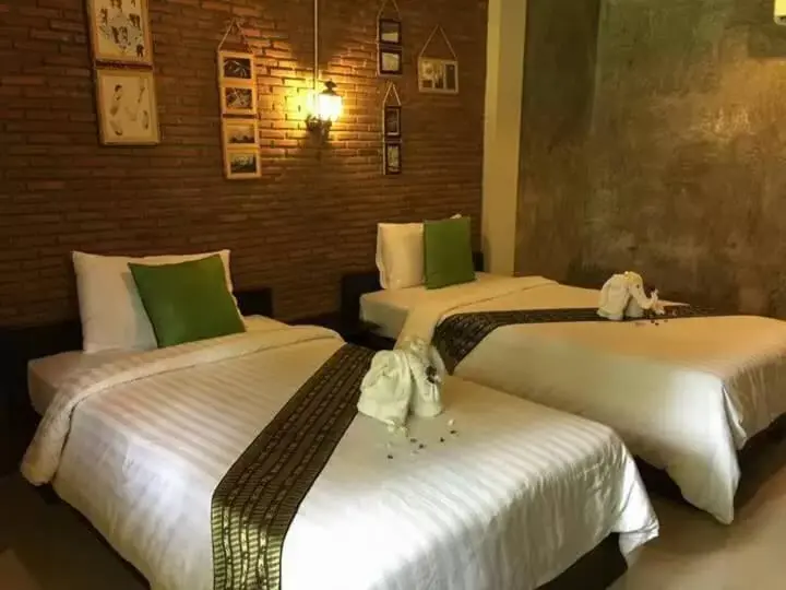 Bed in Bamboo House Resort Bed in Bamboo House Resort