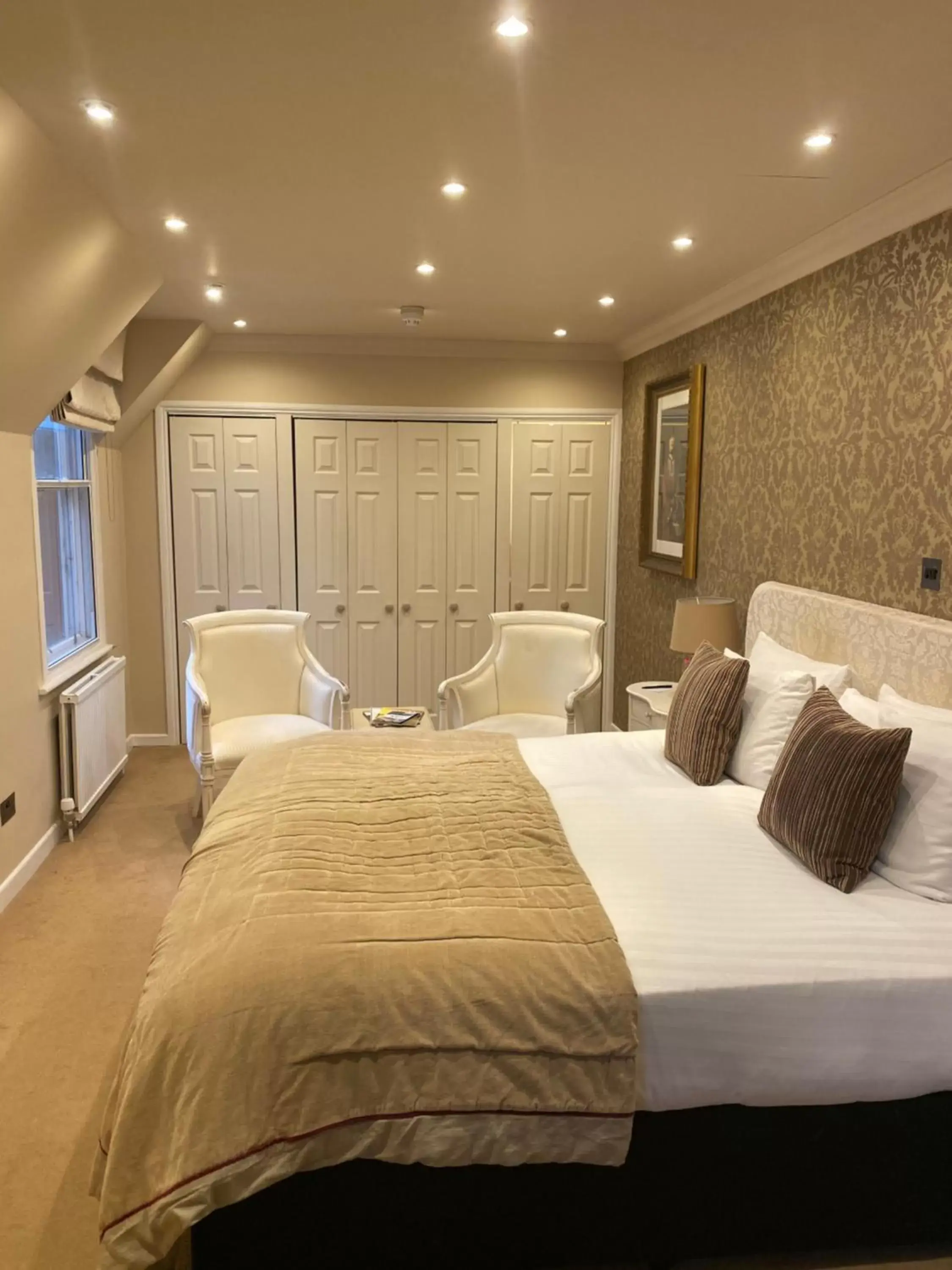 Bed in Langtry Manor Hotel