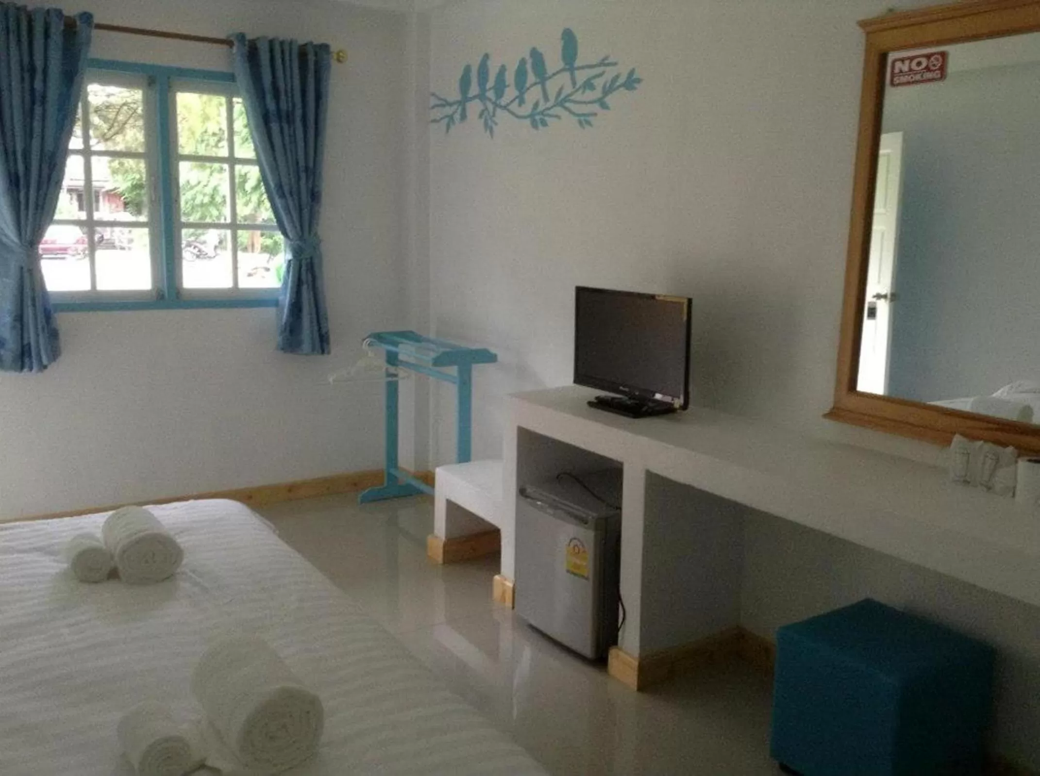 Bed in Bamboo House Resort