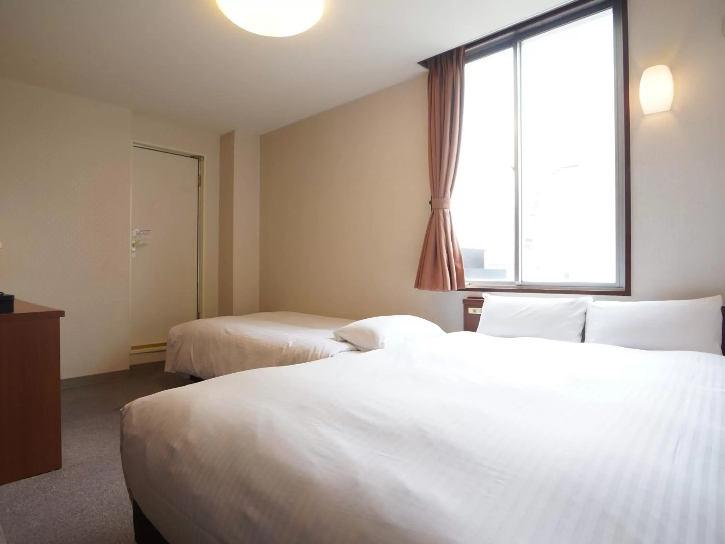 Photo of the whole room, Bed in Kochi Green Hotel Harimayabashi