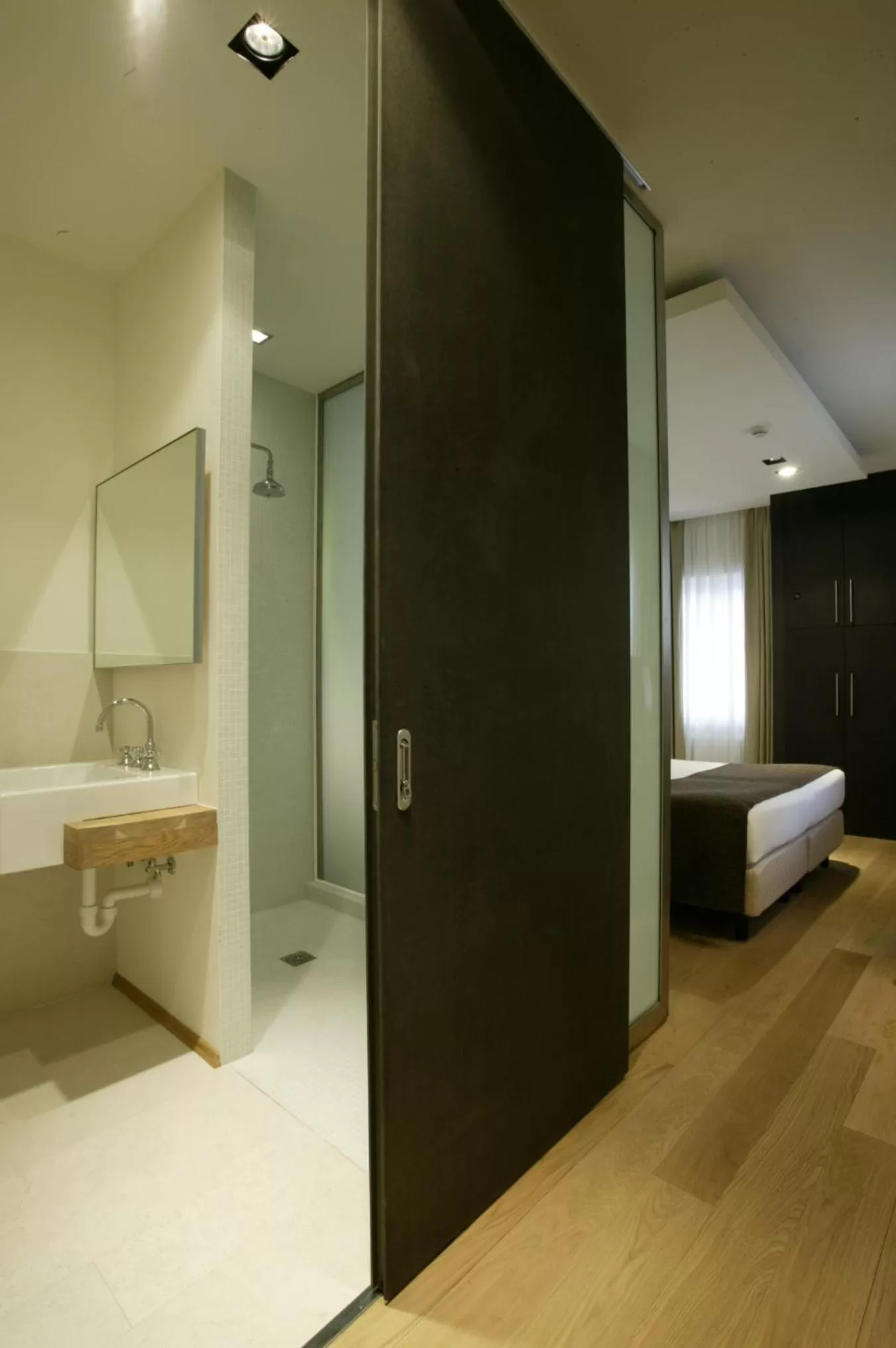 Shower, Bed in Hotel Milano Alpen Resort Meeting&Spa