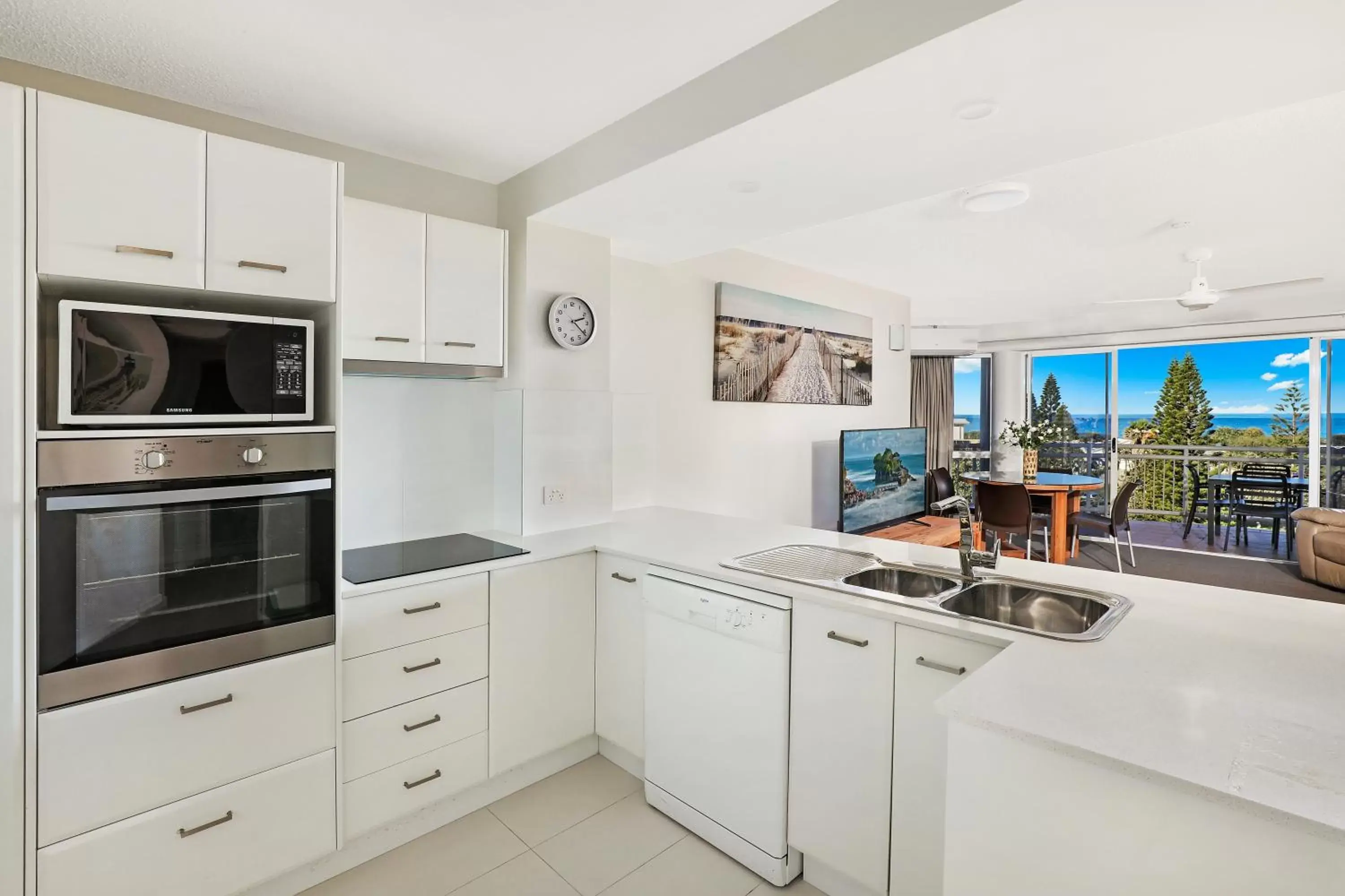 Kitchen/Kitchenette in Beachside Resort Kawana Waters