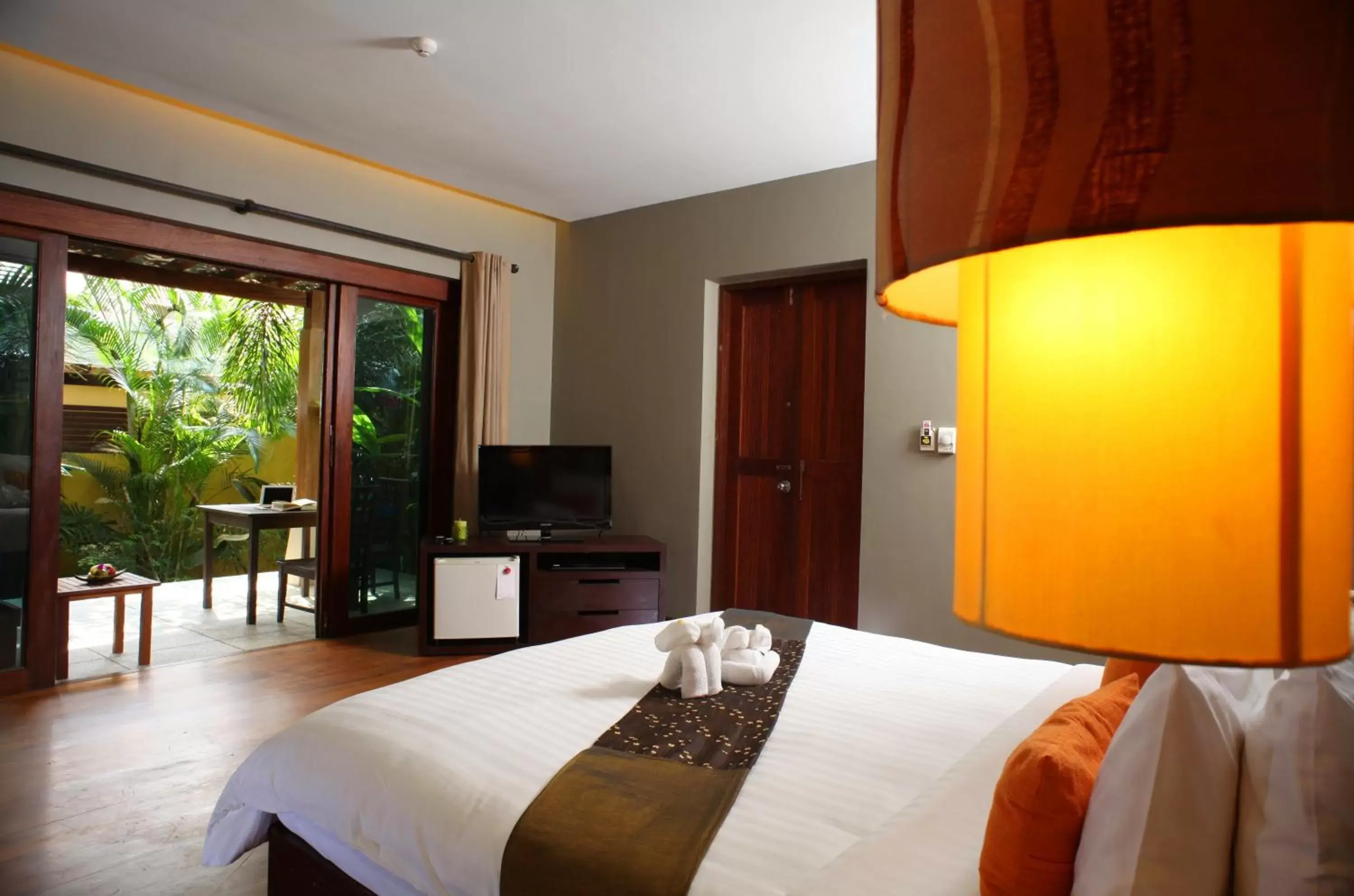 Bed in Chongfah Beach Resort Khaolak - SHA Extra Plus