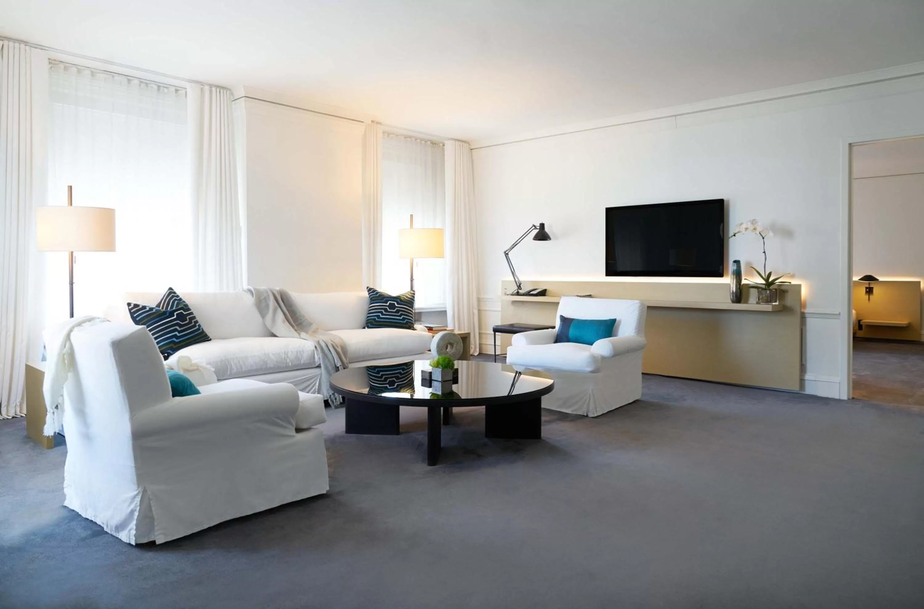 Living room in Ambassador Chicago, part of JdV by Hyatt