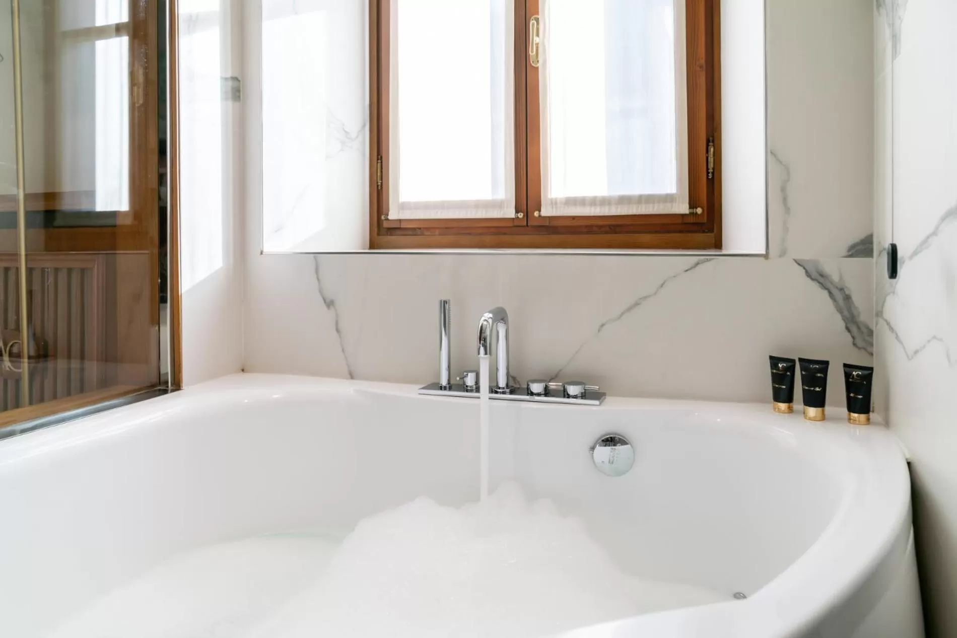 Hot Tub in Ambra Cortina Luxury&Fashion Hotel