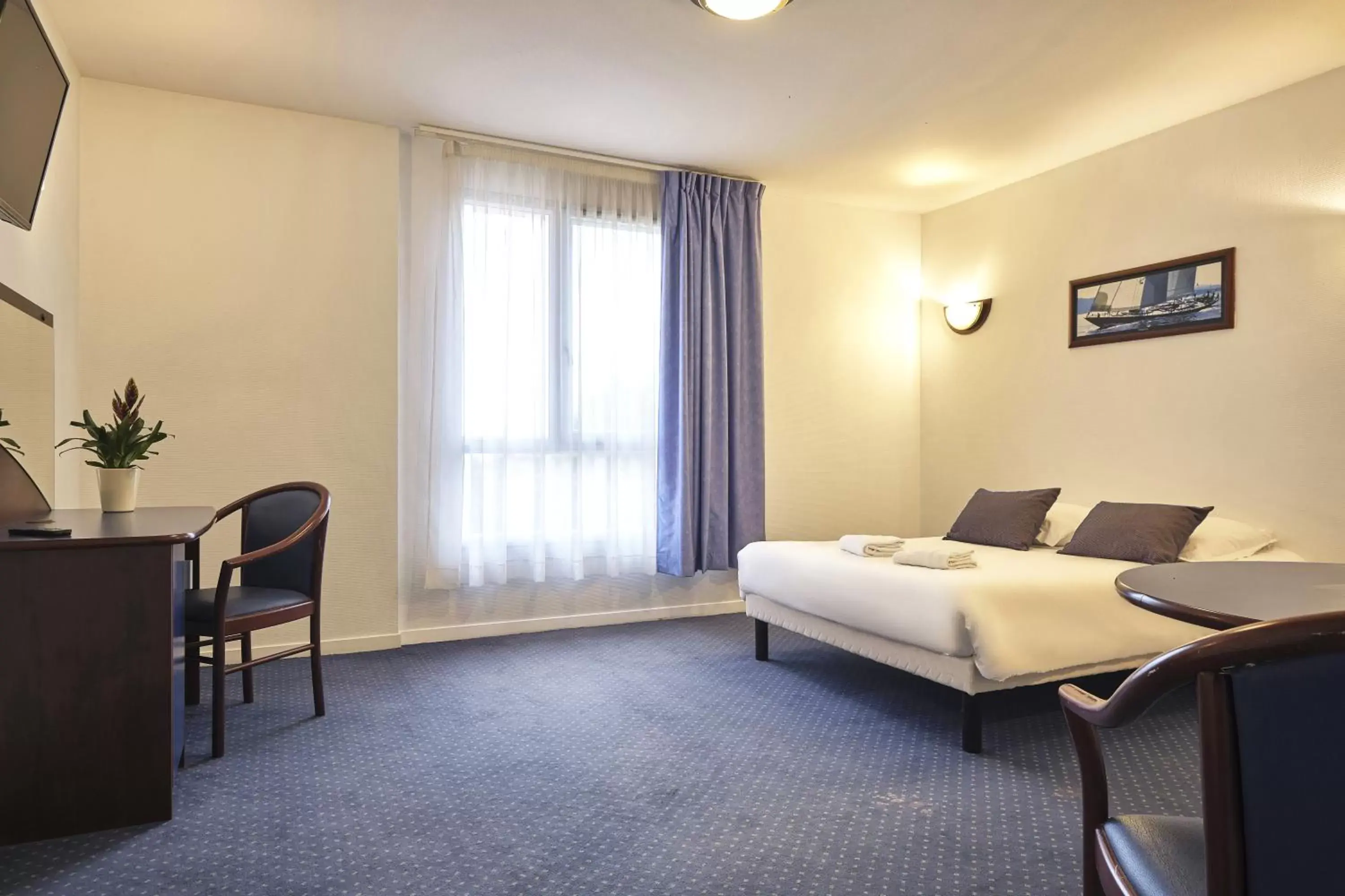 Photo of the whole room, Seating Area in Zenitude Hôtel-Résidences Carcassonne