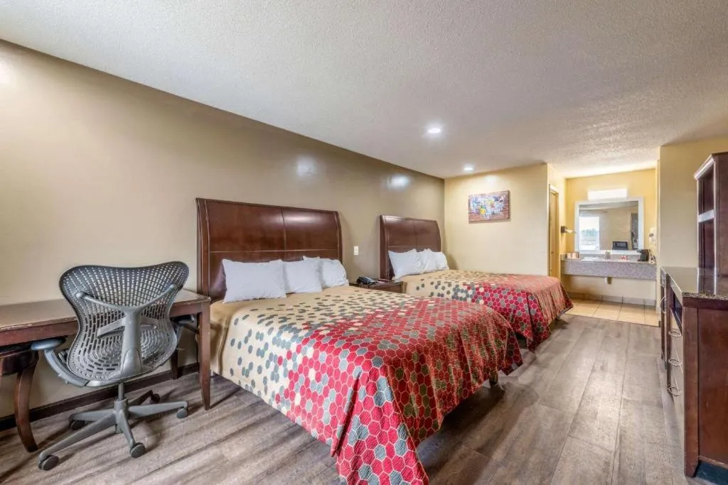 Bed in Southern Inn and Suites