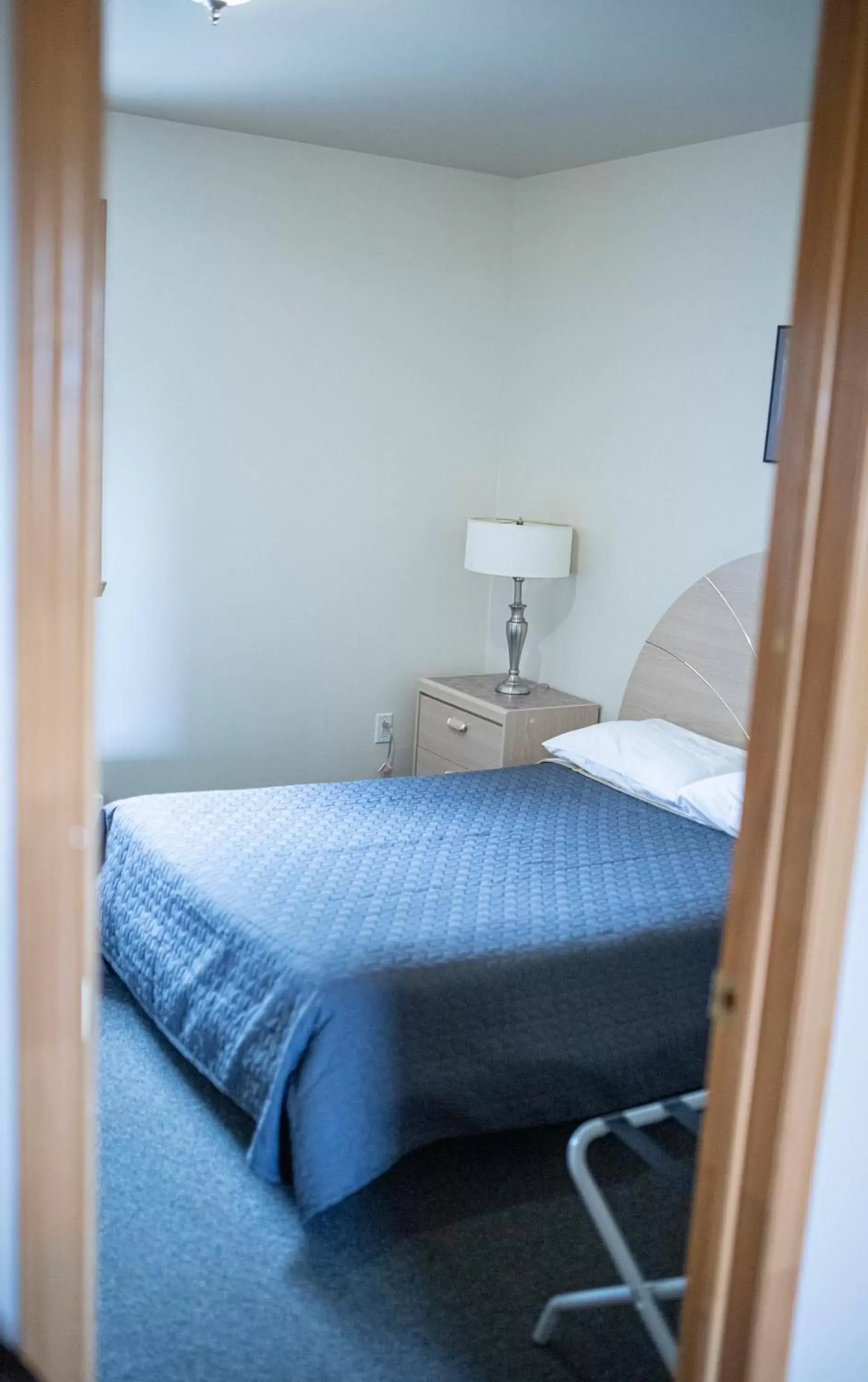 Bedroom, Bed in Motel Et Condo Chez Charley