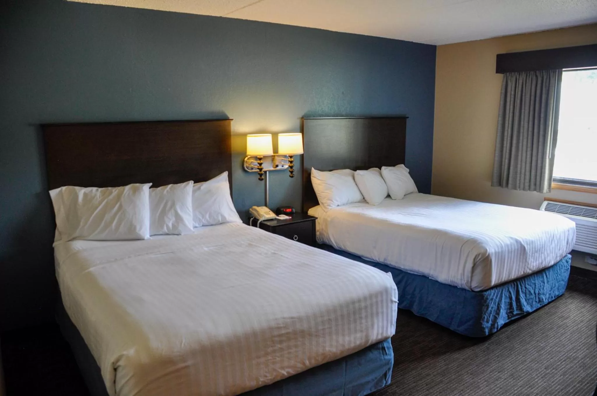 Bedroom, Bed in AmericInn by Wyndham Clear Lake