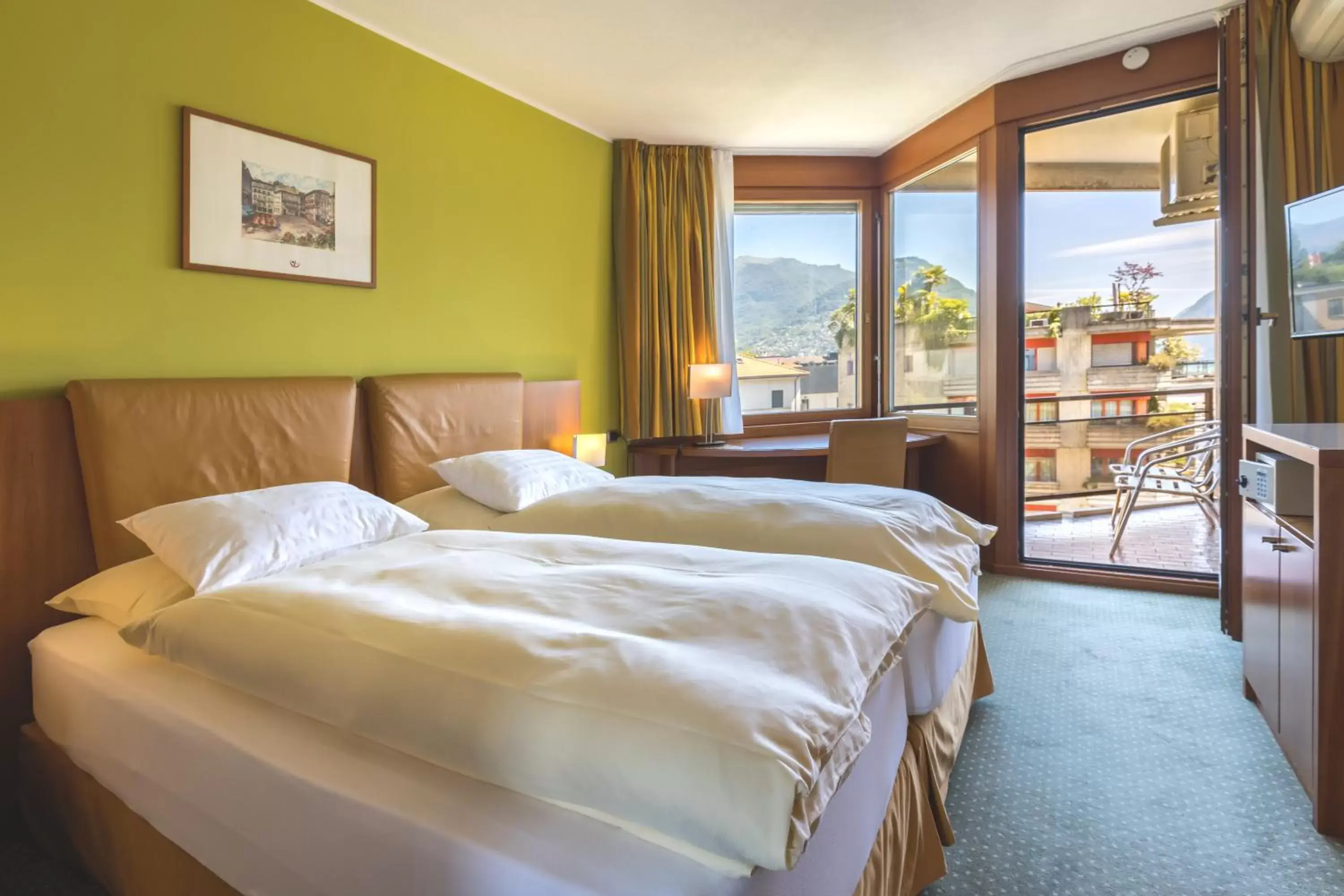 Junior Suite with Partial Lake View in Hotel Delfino Lugano