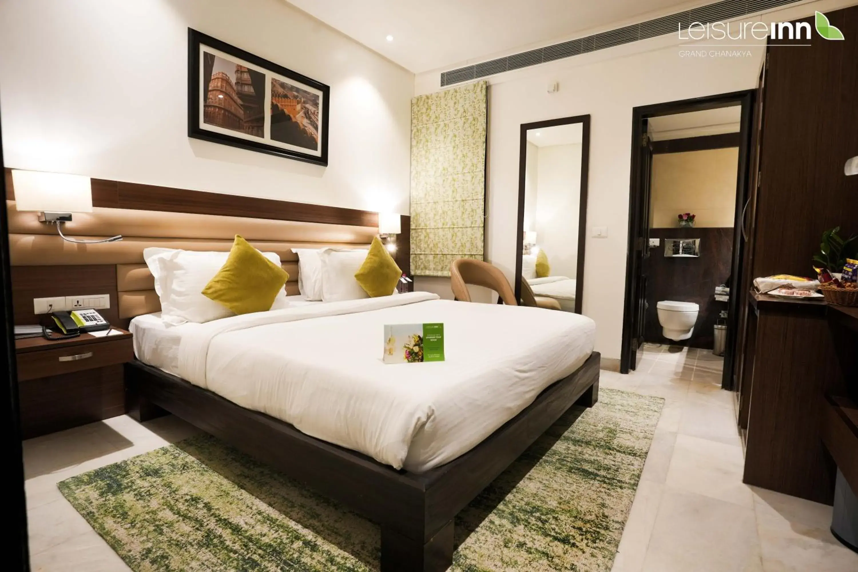 Bed in Leisure Inn Grand Chanakya Bed in Leisure Inn Grand Chanakya