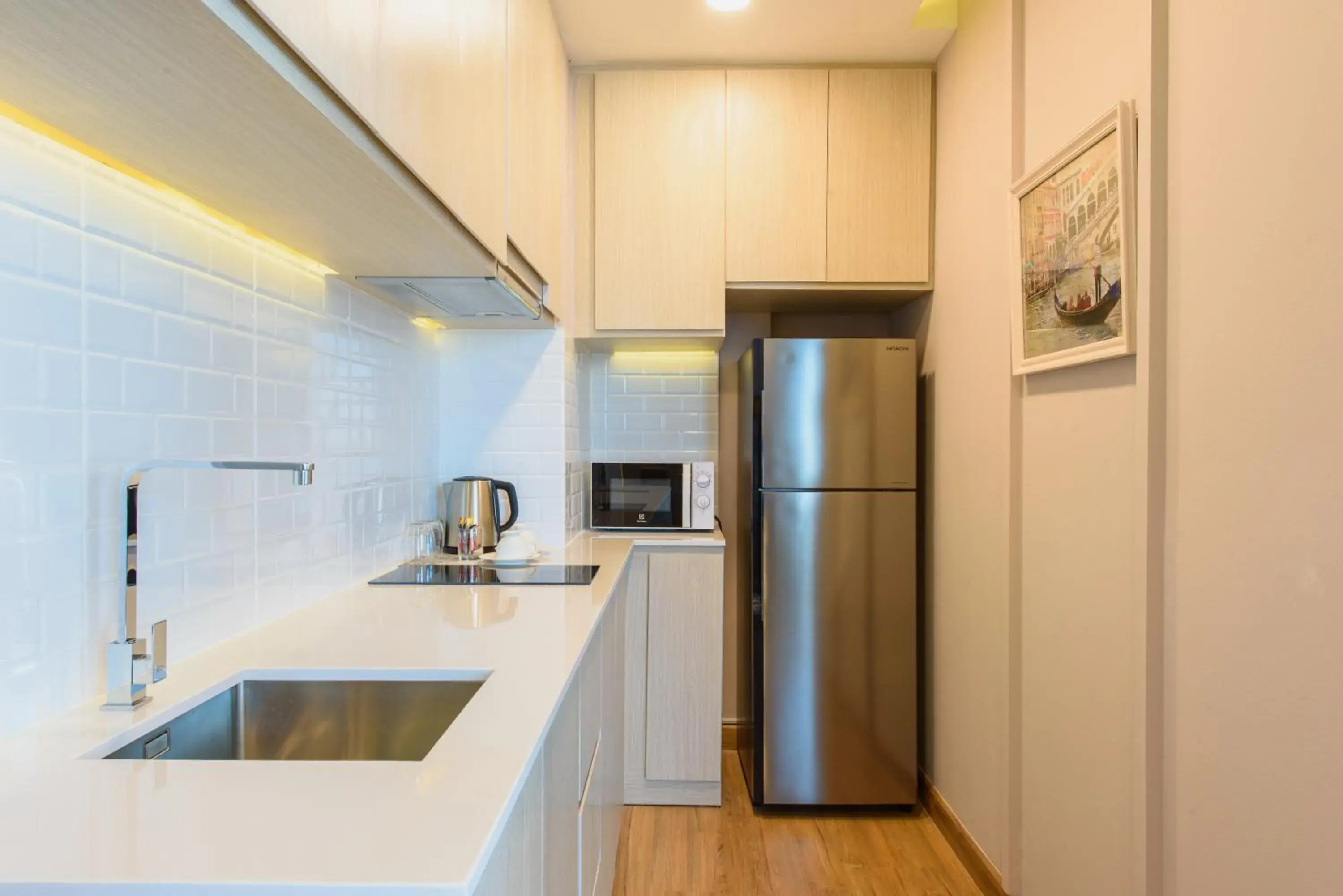 Kitchen/Kitchenette in Parc Borough City Resort -SHA Extra Plus