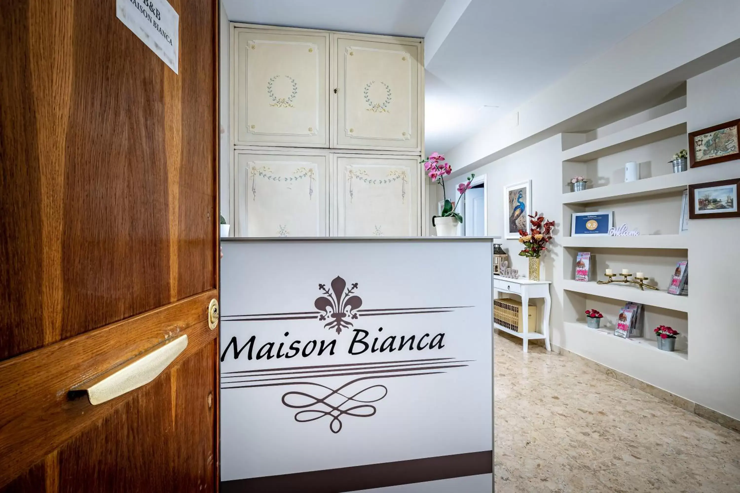 Property logo or sign in Maison Bianca B&B