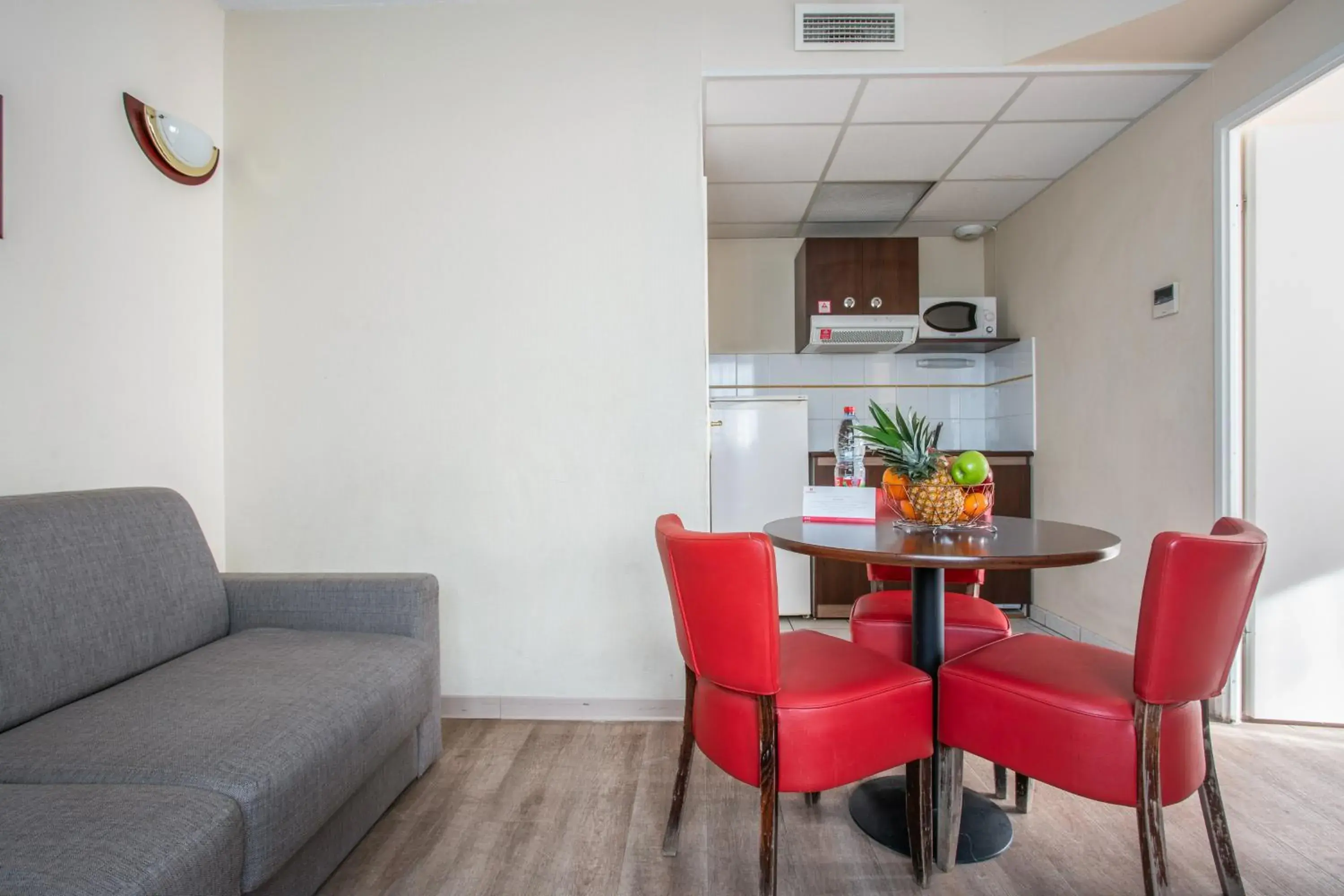 Living room, Dining Area in Appart'City Nimes