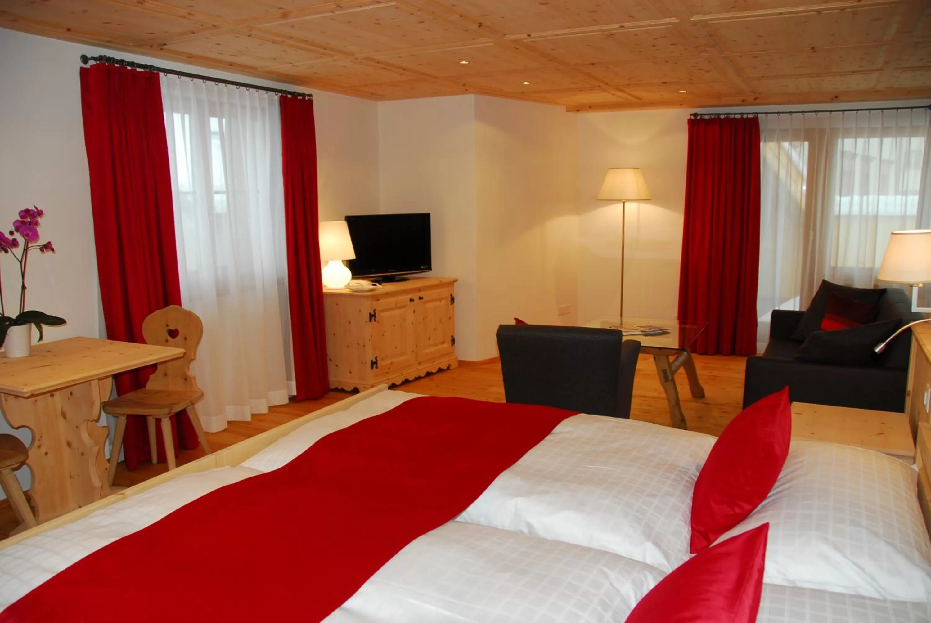 Bed in Hotel Engiadina