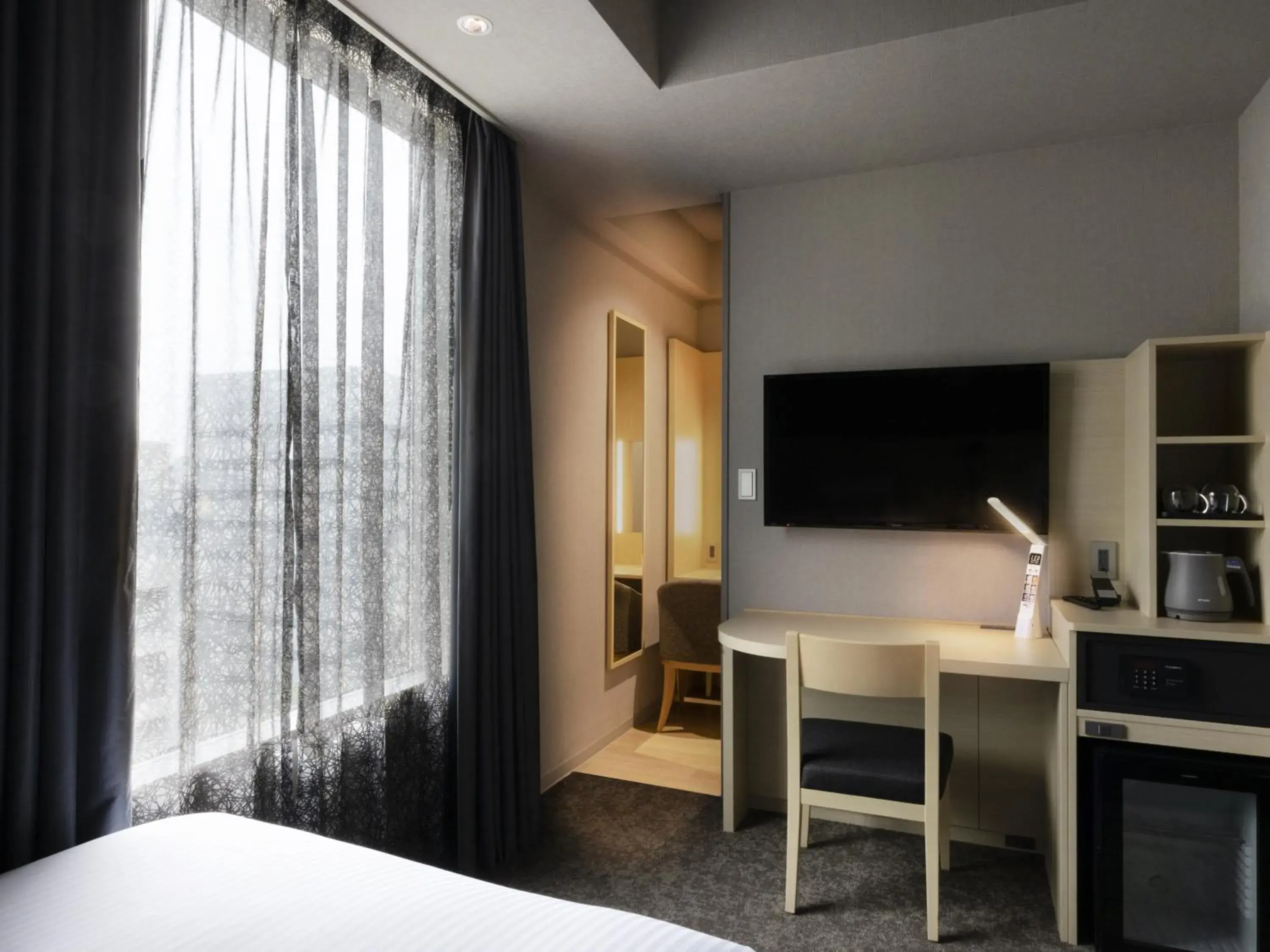 Photo of the whole room, TV/Entertainment Center in ibis Styles Tokyo Ginza East