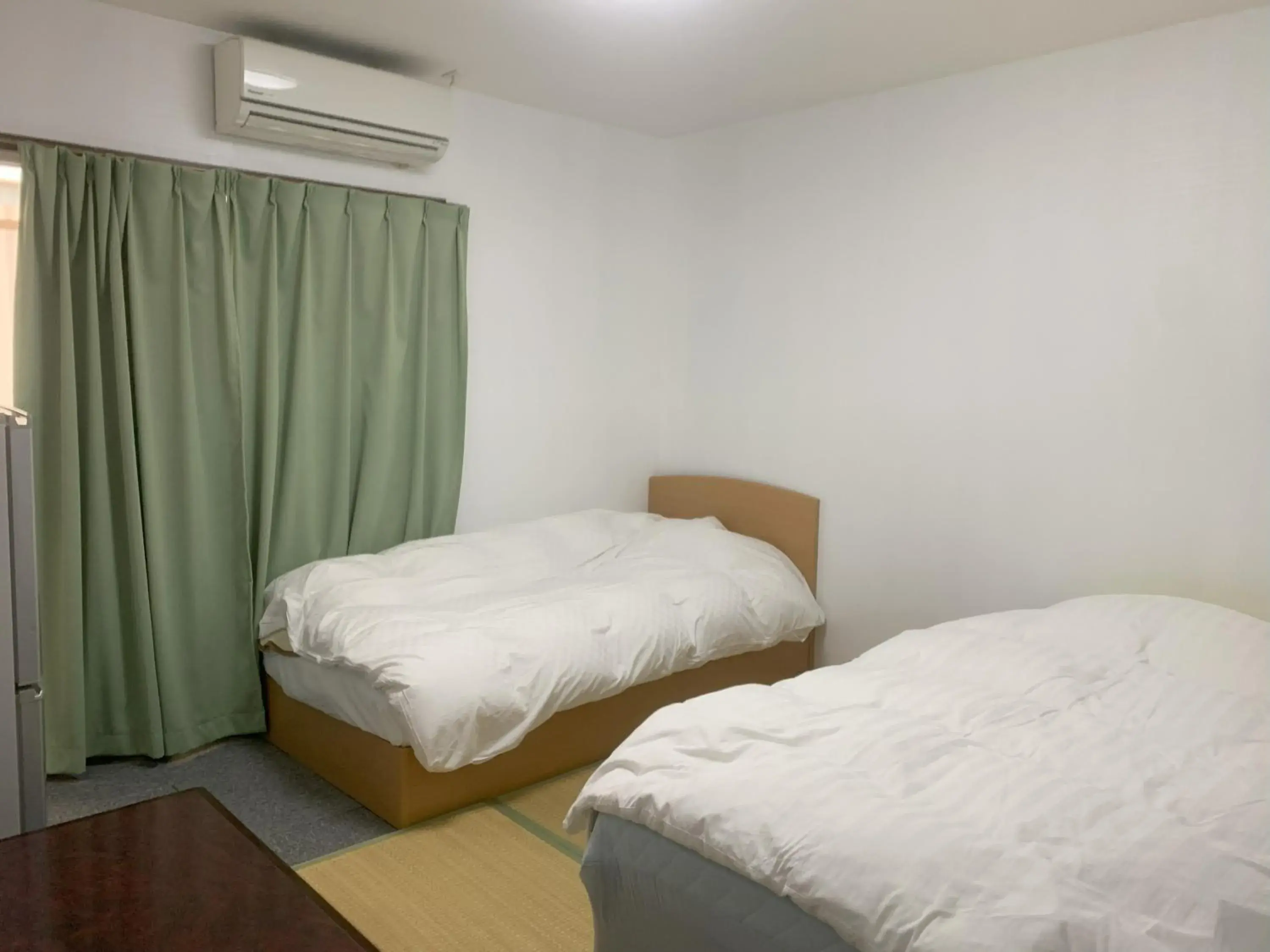 Bed in Oyama Guest House Kyoto
