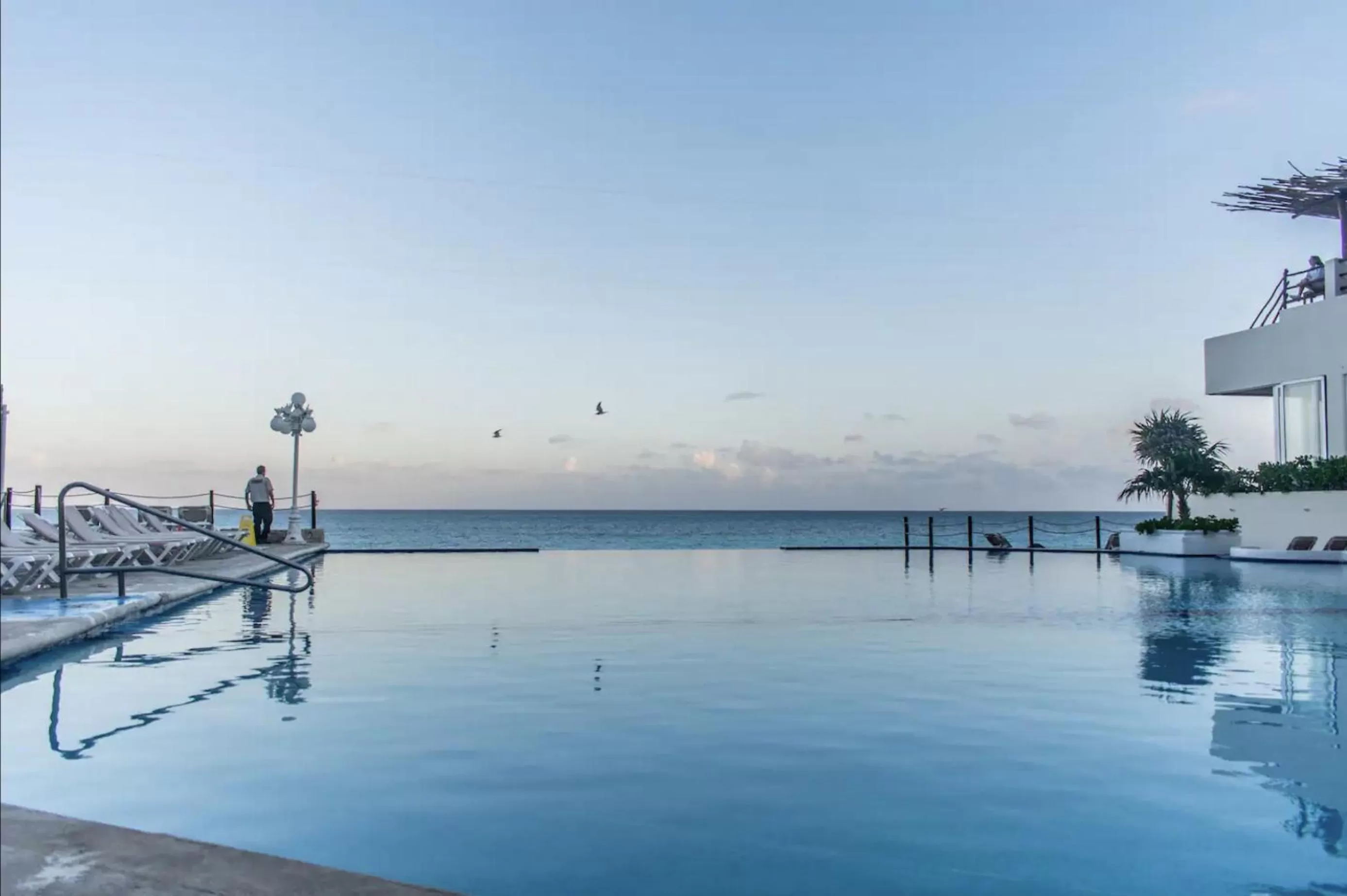 Swimming Pool in Cancun Beach&Sunrise
