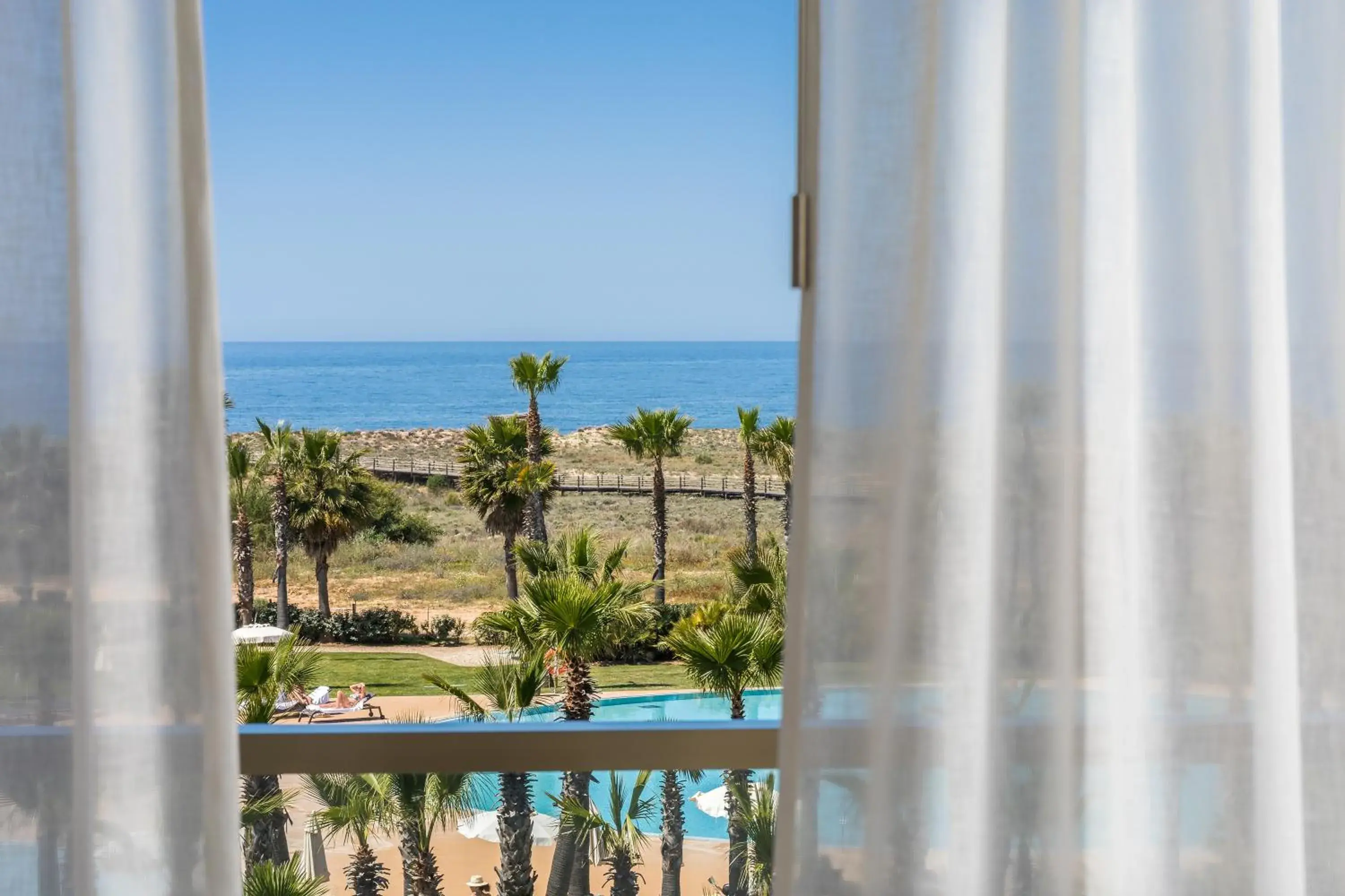 Balcony/Terrace, Pool View in NAU Salgados Dunas Suites