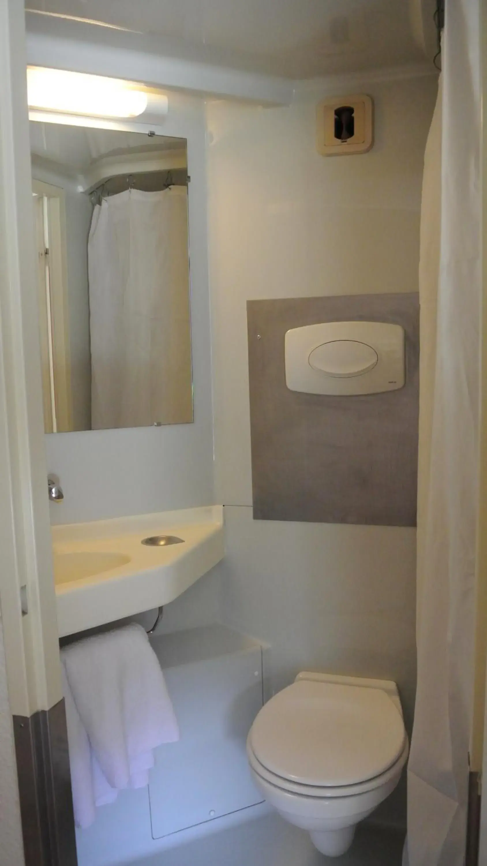 Toilet, Bathroom in Premiere Classe Lyon Sud - Chasse Sur Rhône