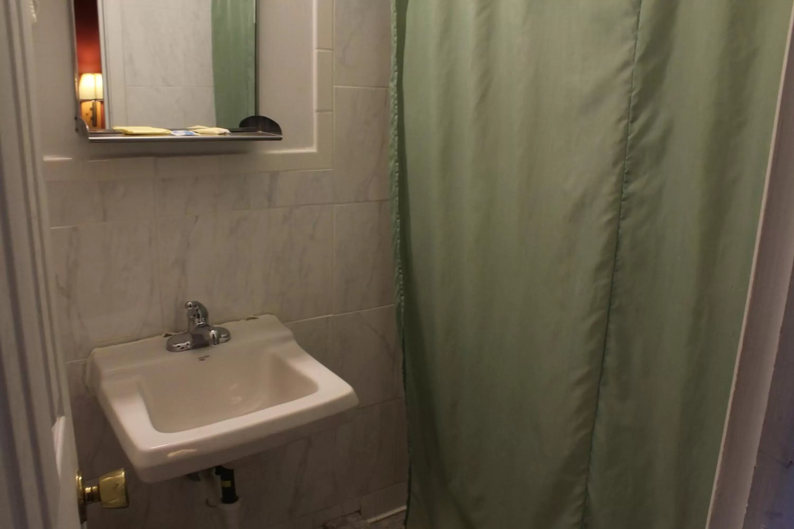 Bathroom in Budget Host Inn Fridley