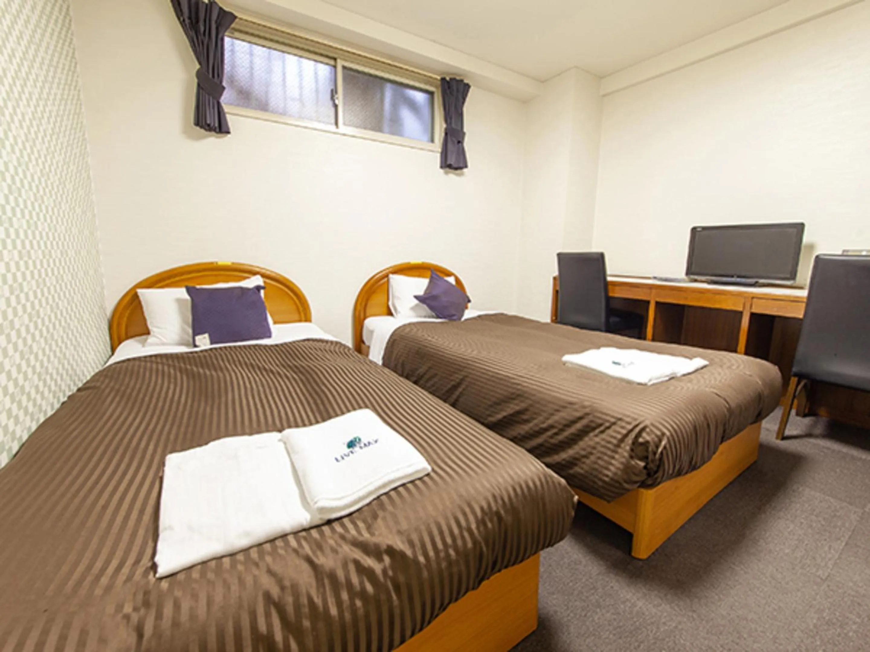 Bed in HOTEL LiVEMAX BUDGET Nippori