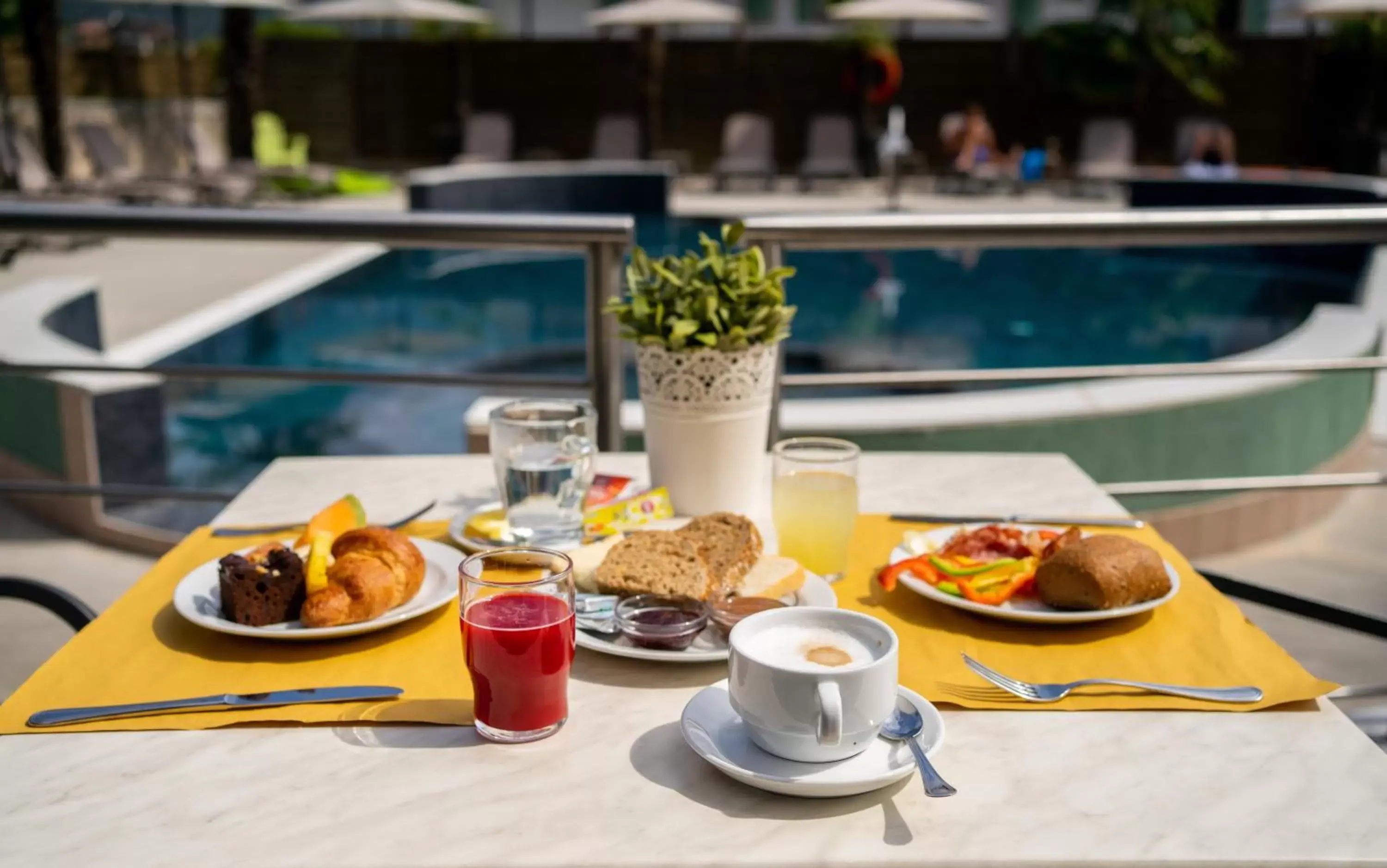 Breakfast, Swimming Pool in Hotel Rudy