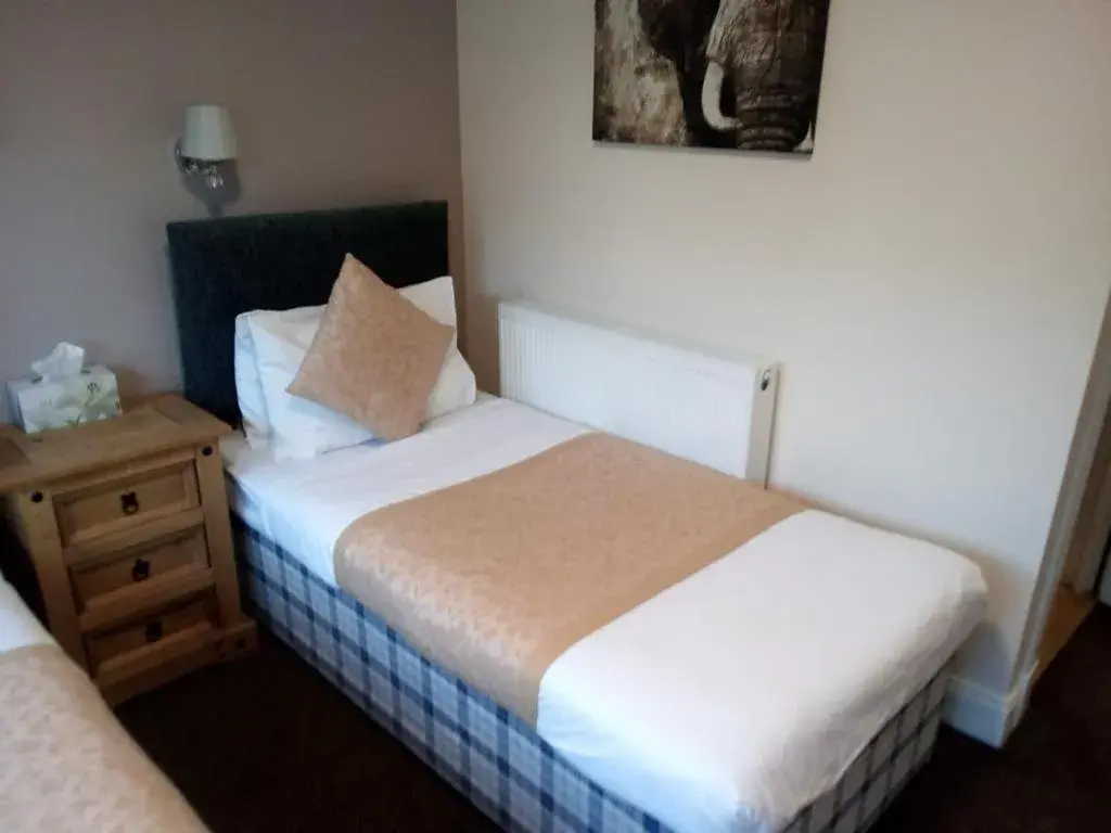 Bed in The Waverley Inn
