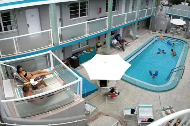 Balcony/Terrace, Pool View in Camelot Beach Suites