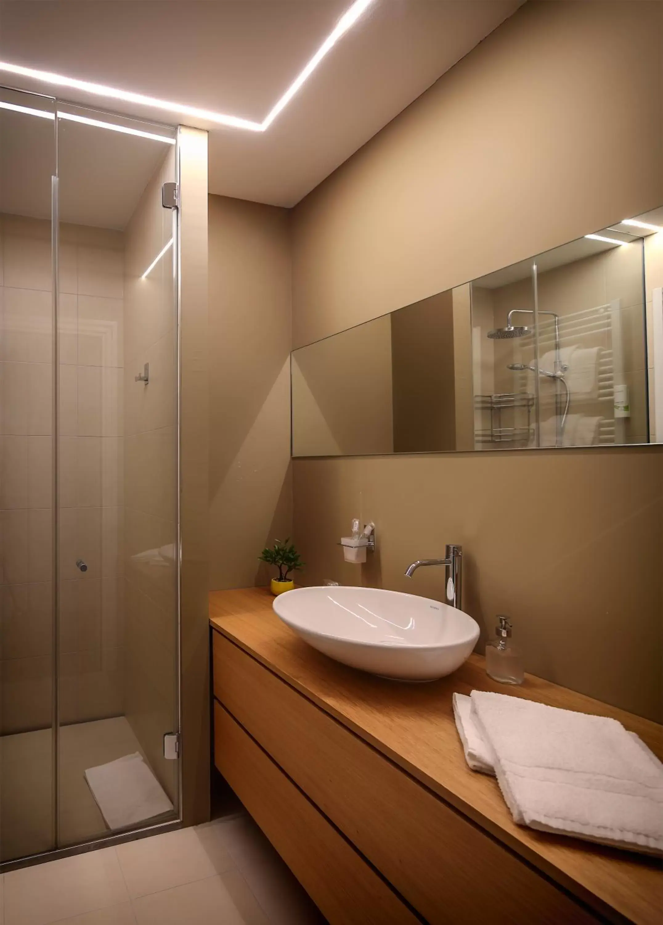 People, Bathroom in Lainez Rooms & Suites