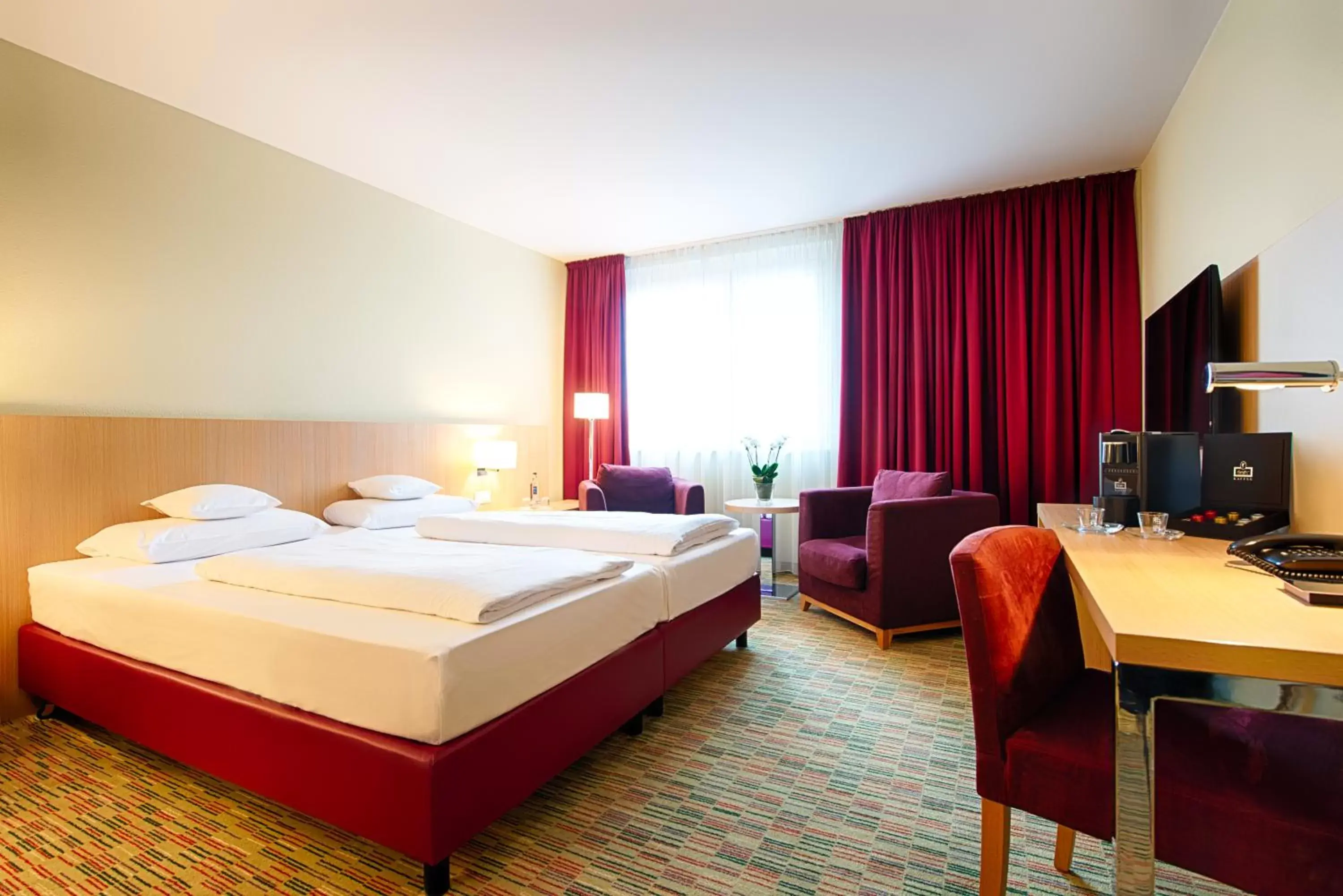 Photo of the whole room, Bed in Welcome Hotel Paderborn