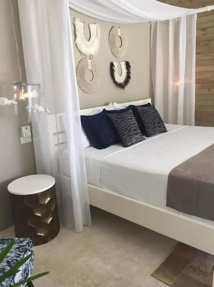 Bed in Mahona Boutique Hotel