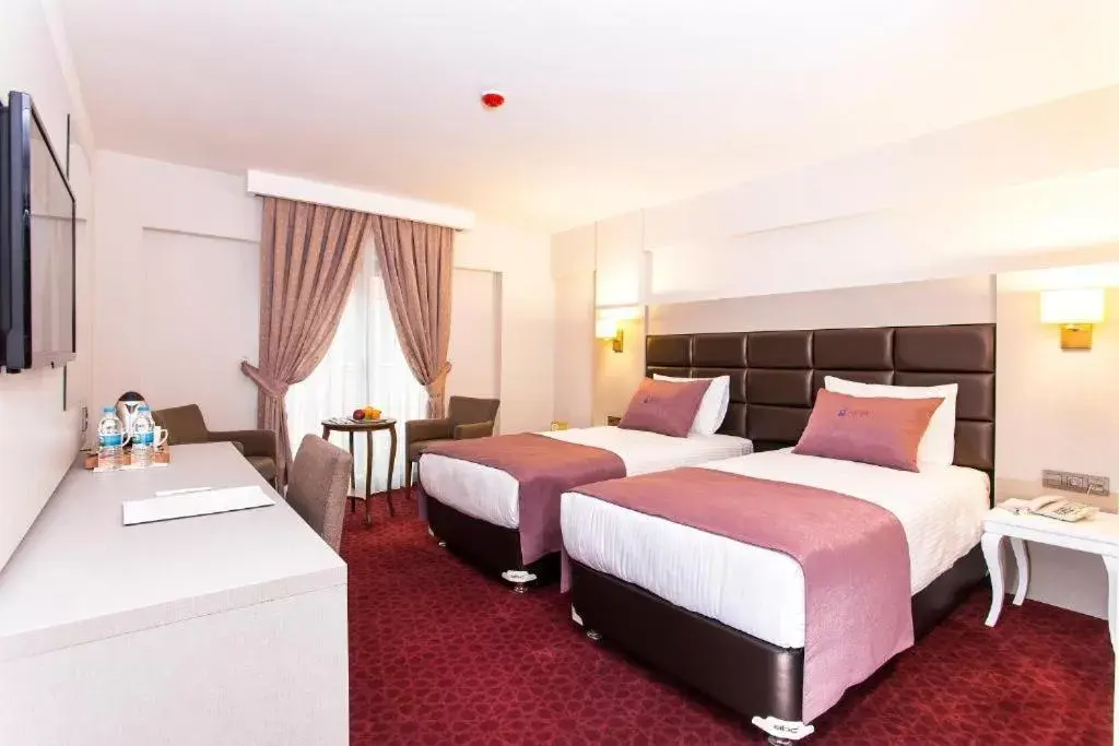 Photo of the whole room, Bed in Perla Arya Hotel Photo of the whole room, Bed in Perla Arya Hotel