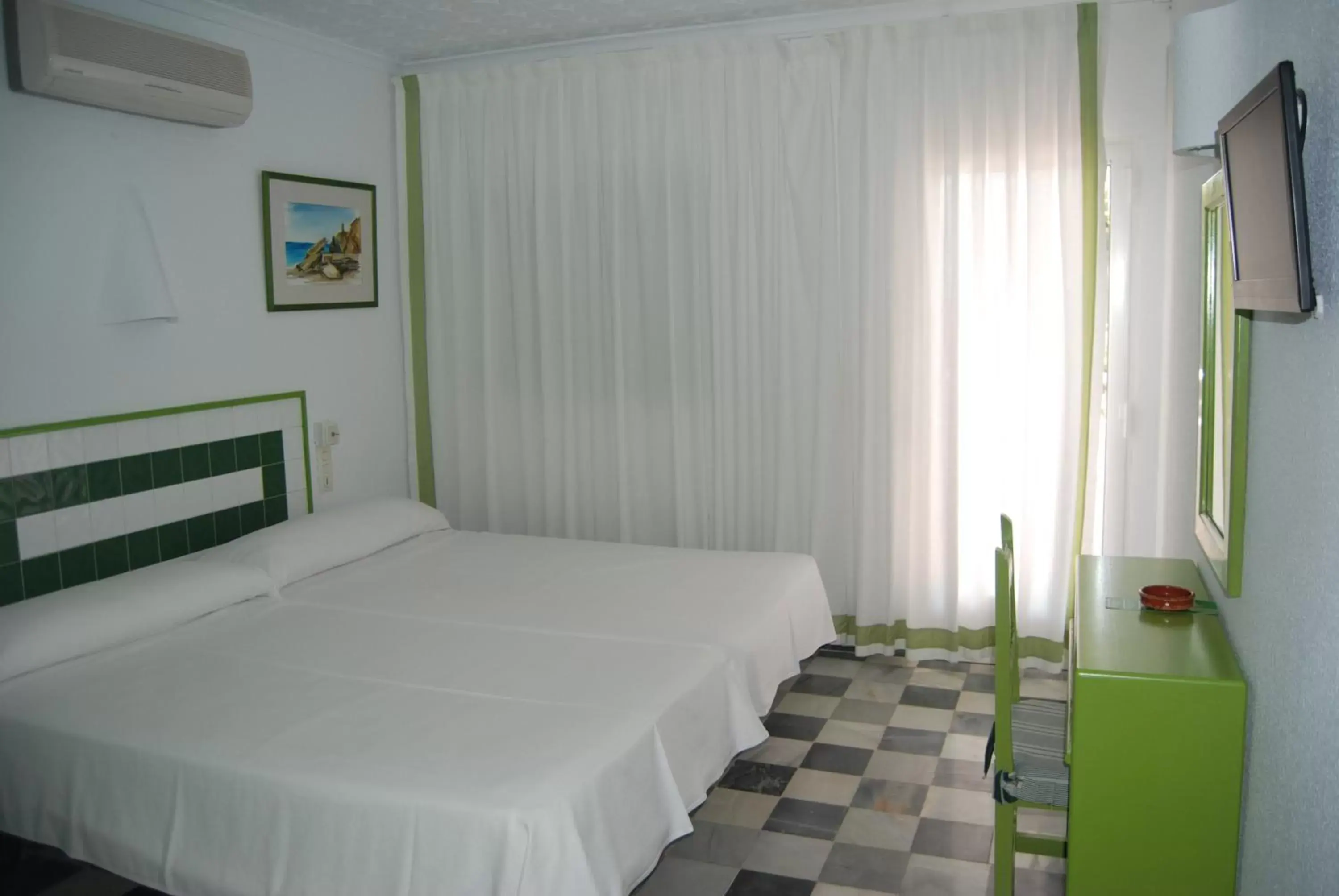 Bed in Hotel El Puntazo I