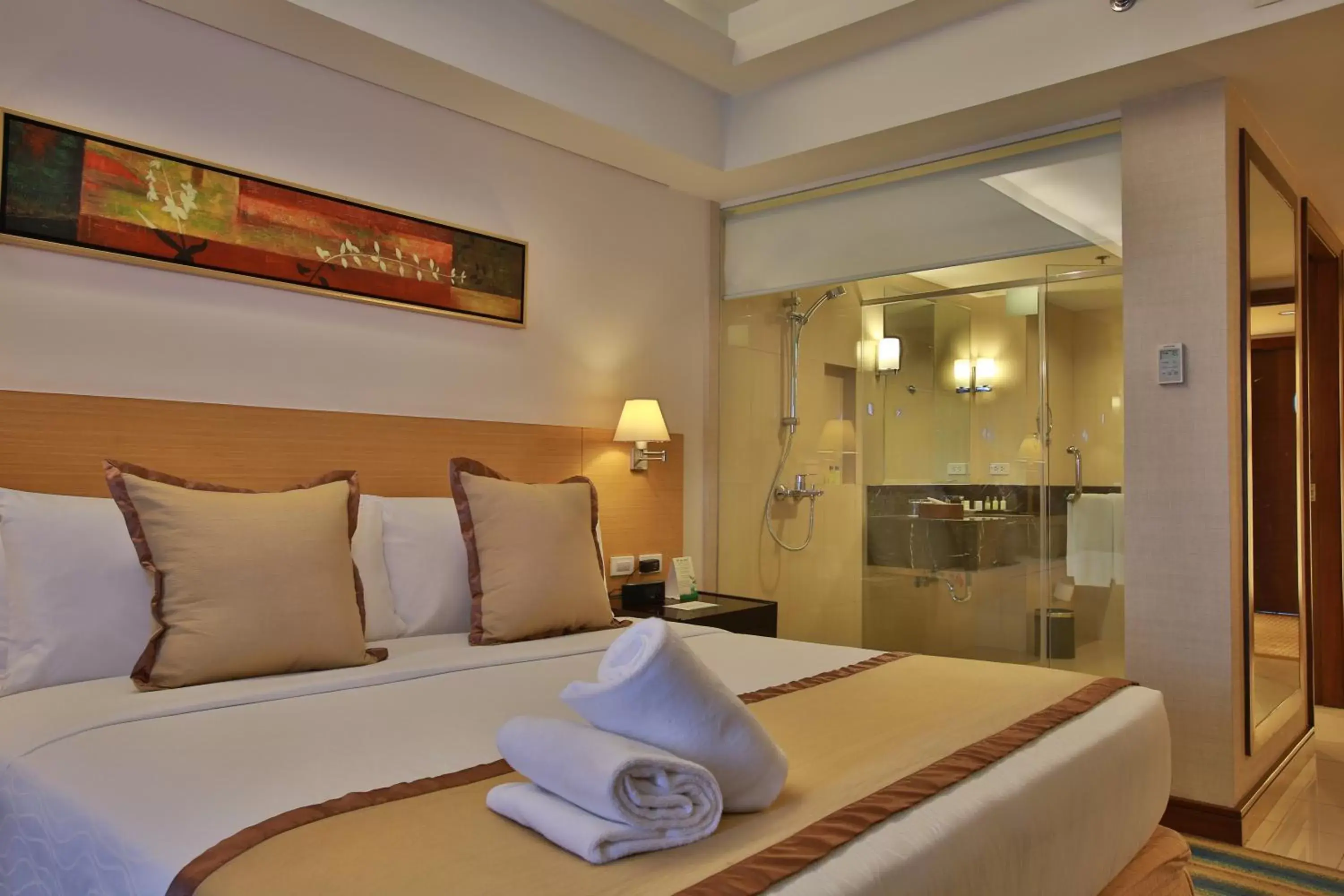 Shower, Bed in Luxent Hotel