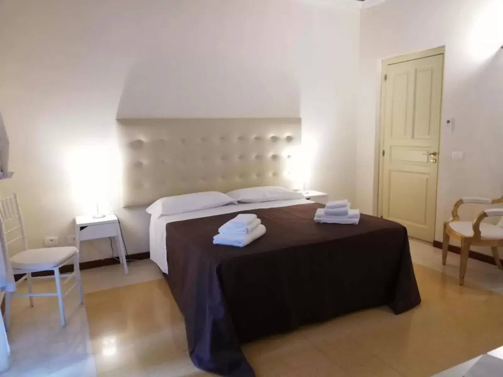 Bed in Landolina Palace Hotel