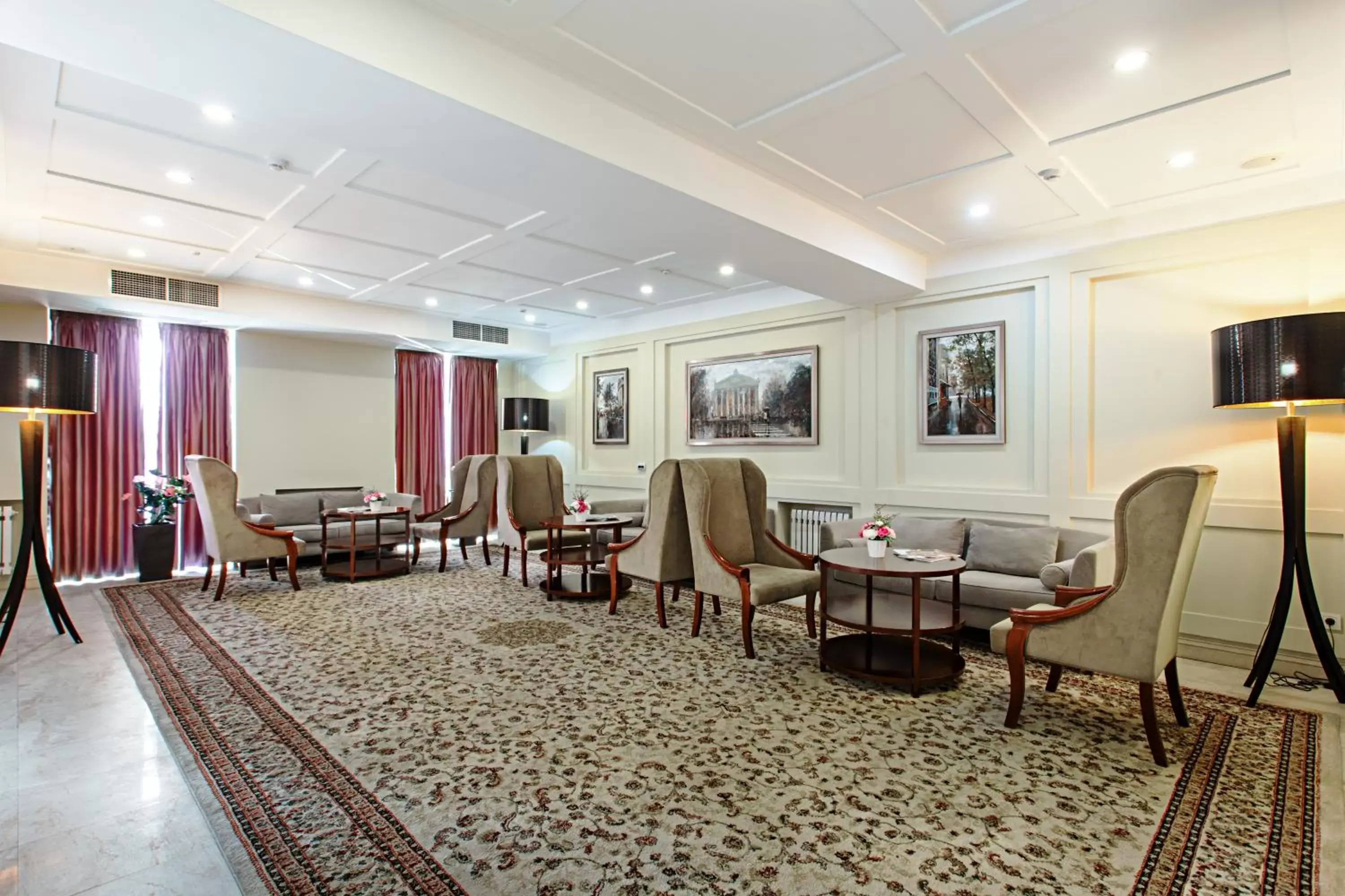 Communal lounge/ TV room, Restaurant/Places to Eat in Ambassador Hotel