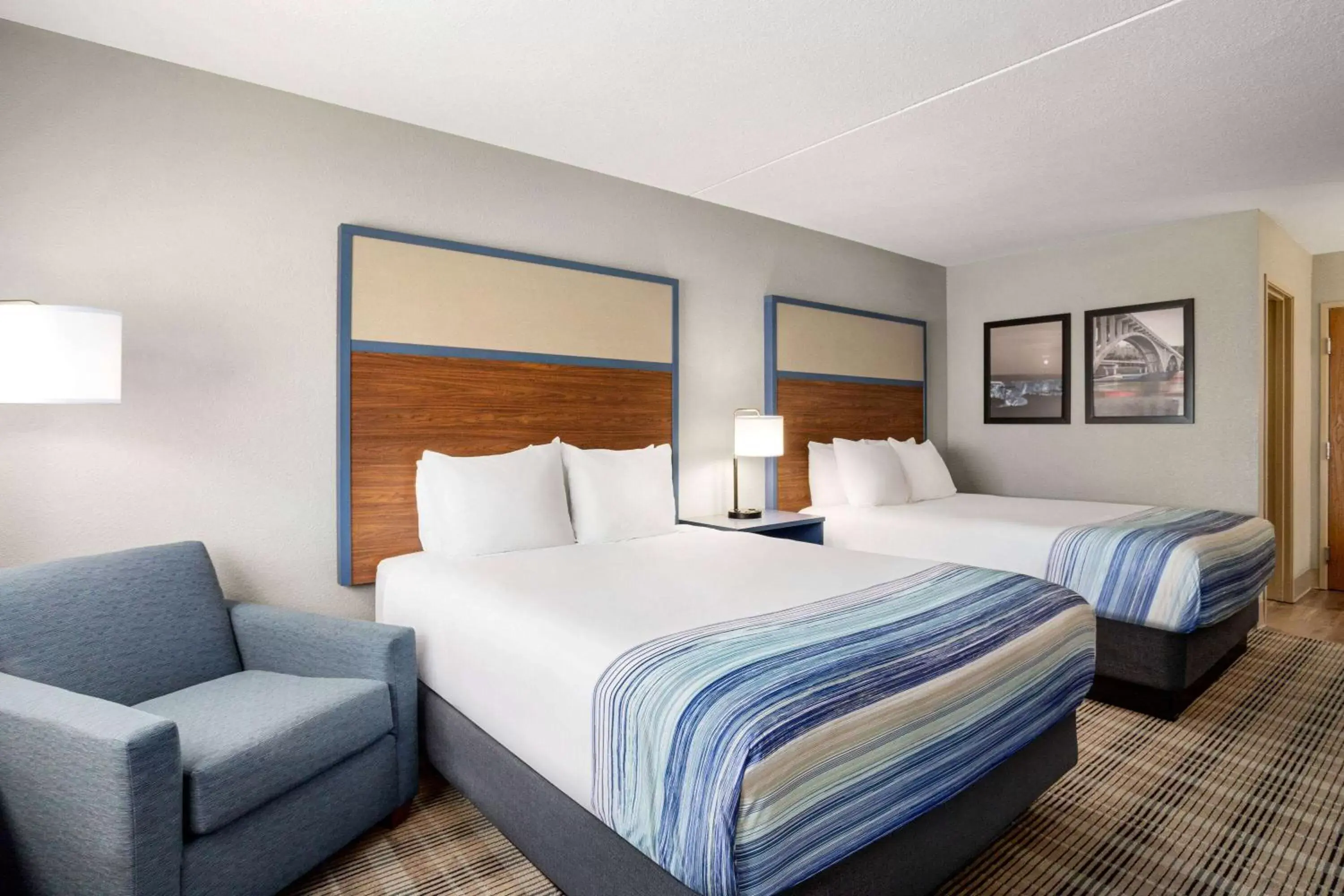 Photo of the whole room, Bed in AmericInn by Wyndham Branson & Conference Center