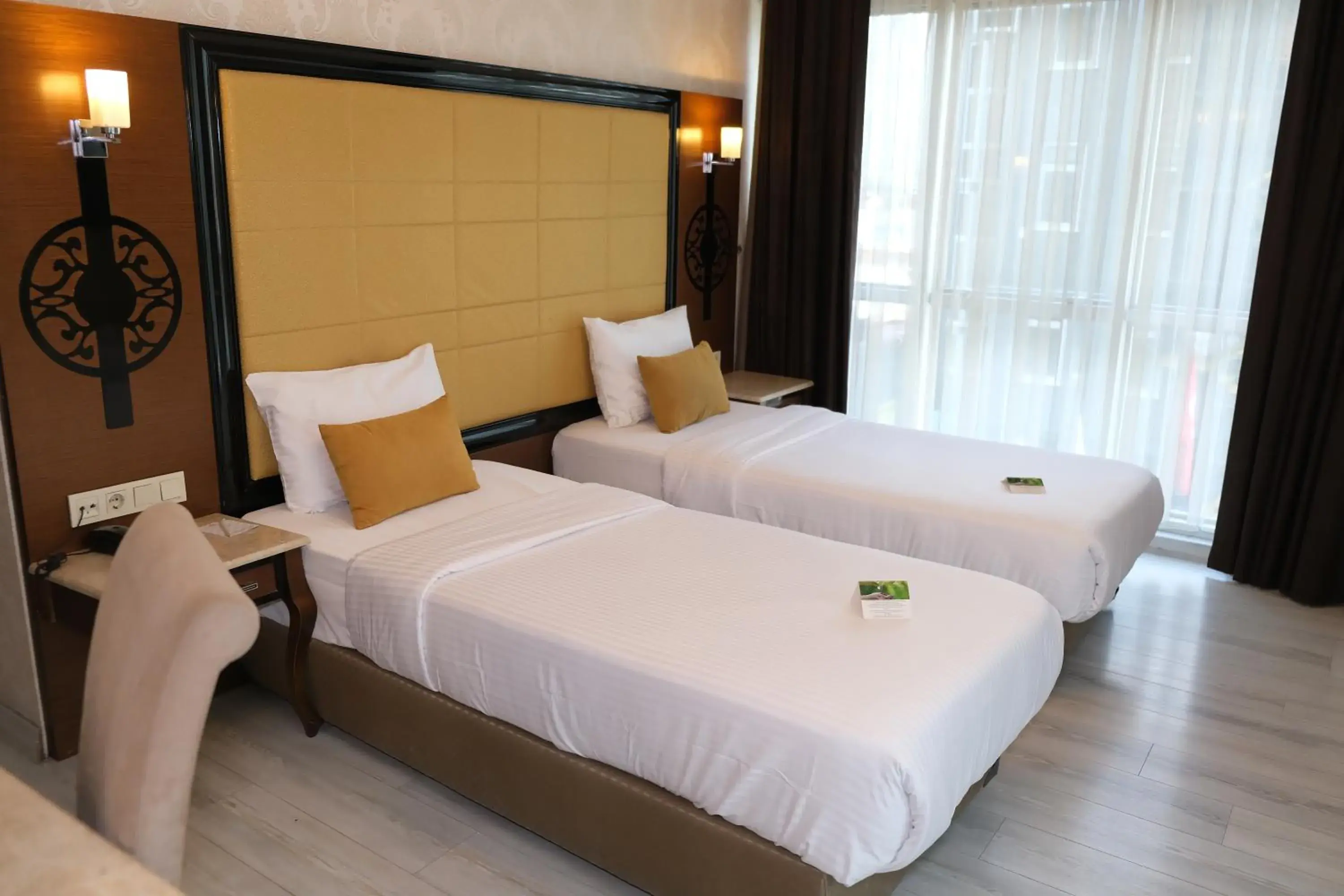 Bed in Asia City Hotel