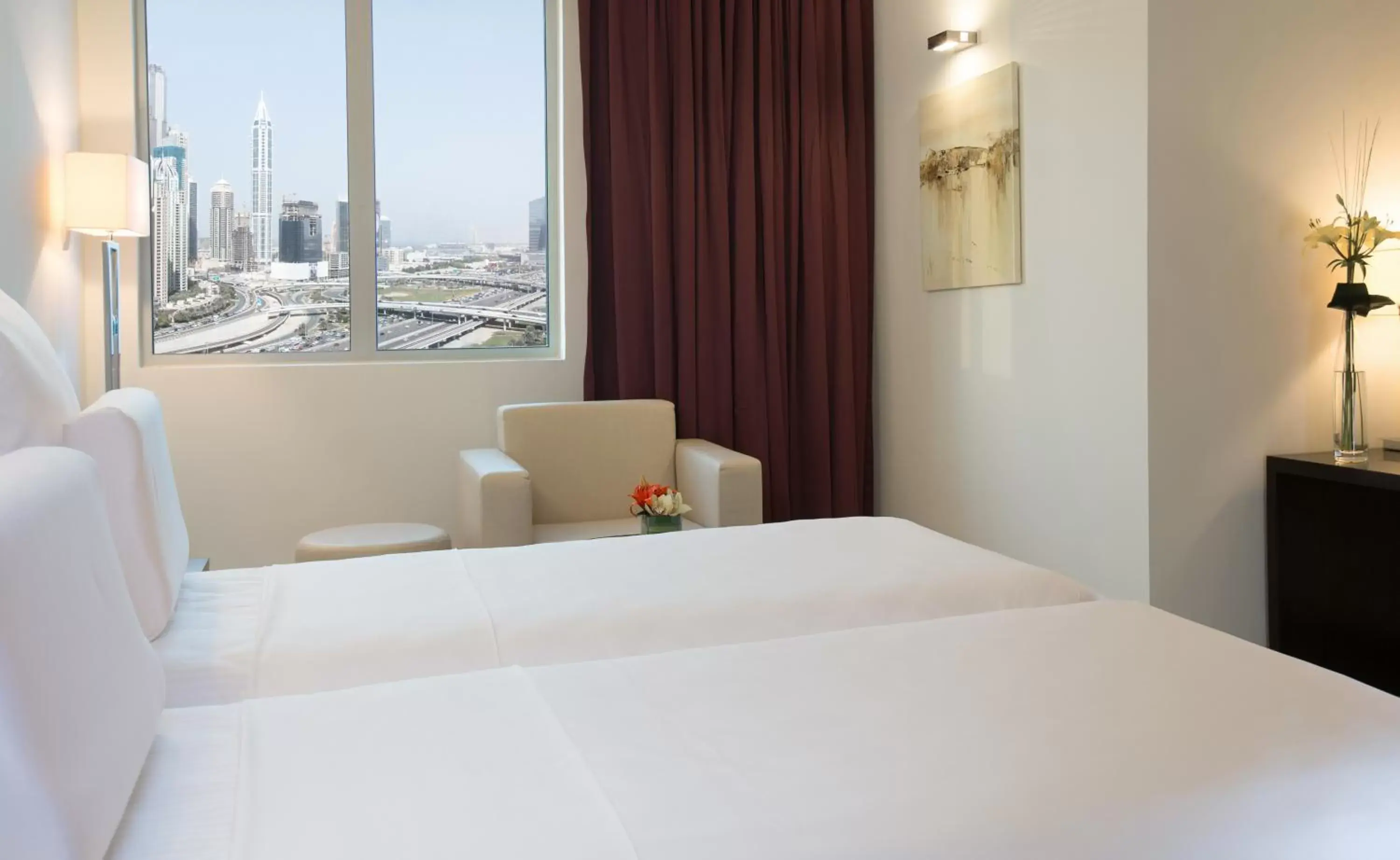 Bed in Pullman Dubai Jumeirah Lakes Towers
