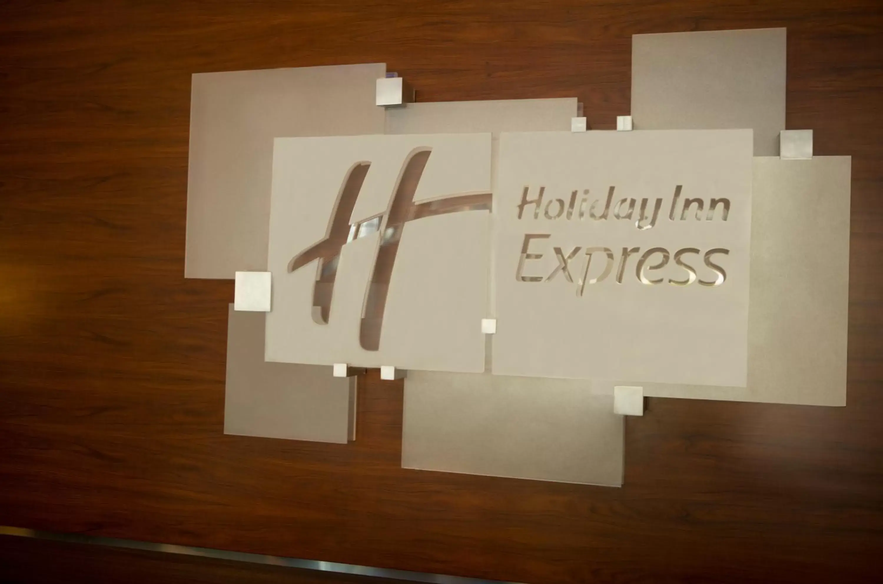 Property logo or sign in Holiday Inn Express Jakarta International Expo, an IHG Hotel