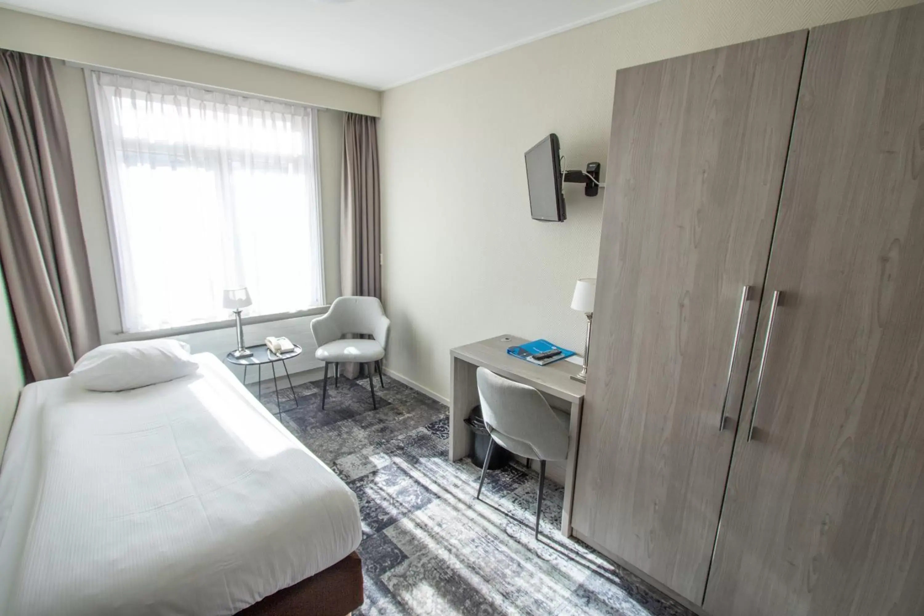 Photo of the whole room in Fletcher Hotel Restaurant Marijke Photo of the whole room in Fletcher Hotel Restaurant Marijke