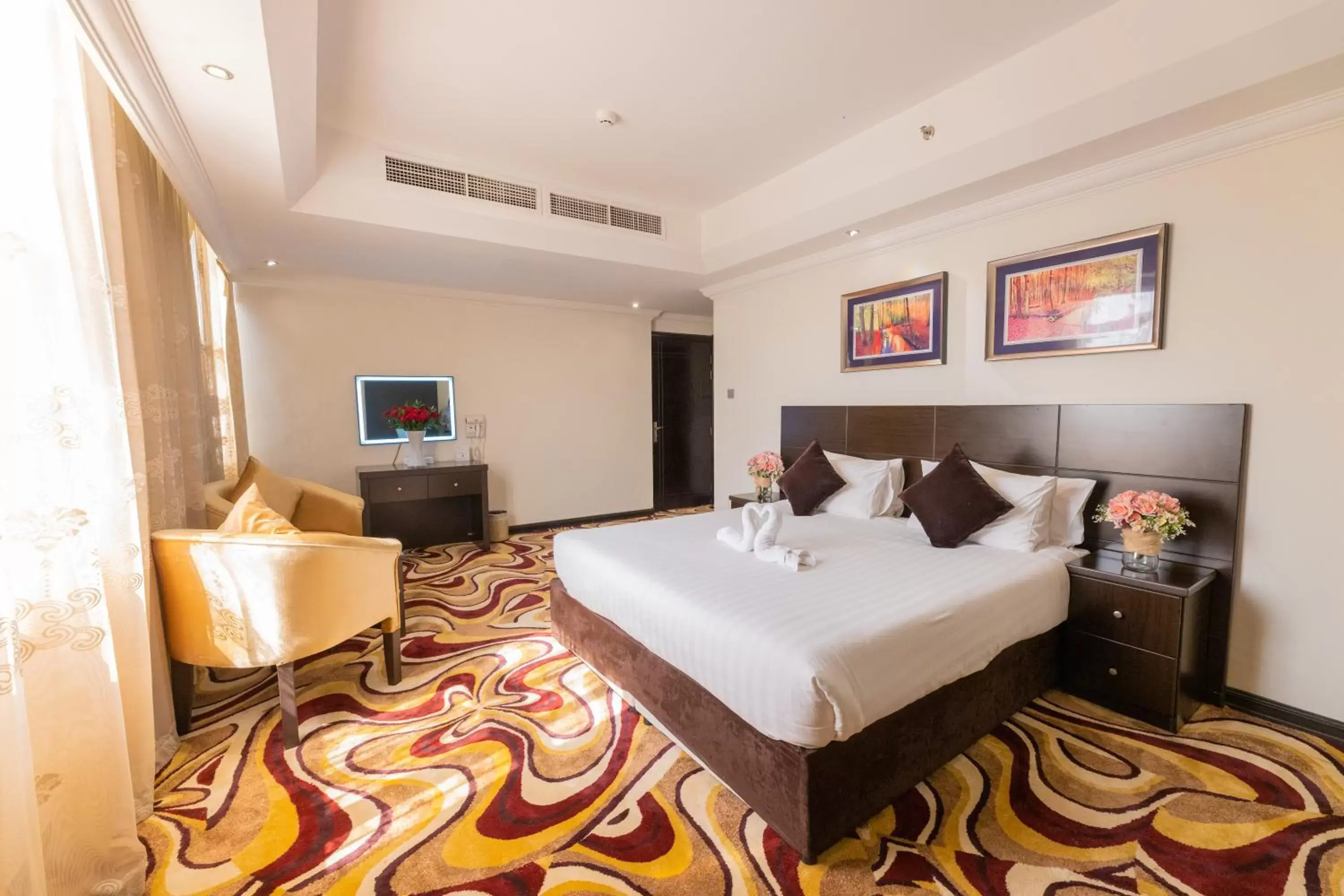 Bedroom, Bed in Ewan Ajman Suites Hotel