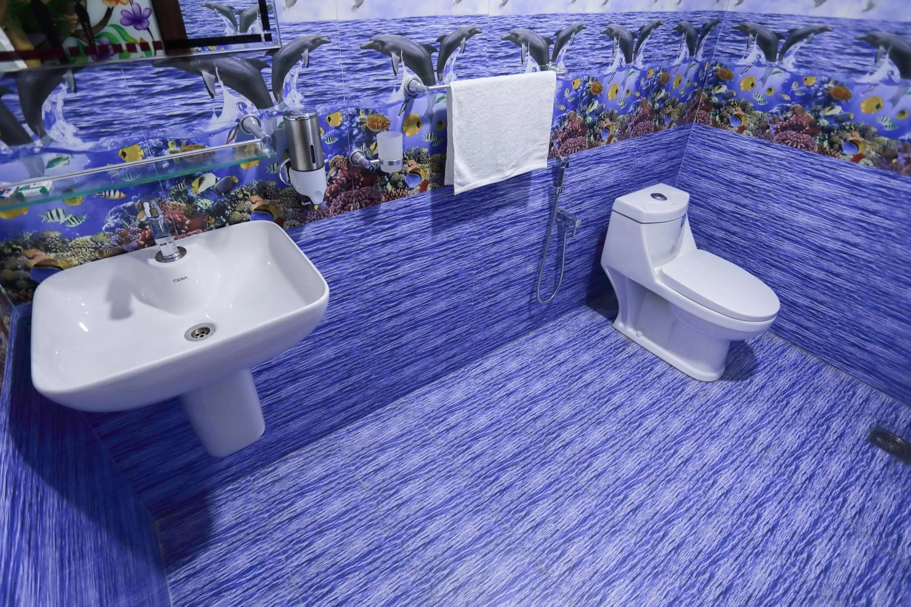 Toilet in LEISURE VALLEY BEACH RESORT